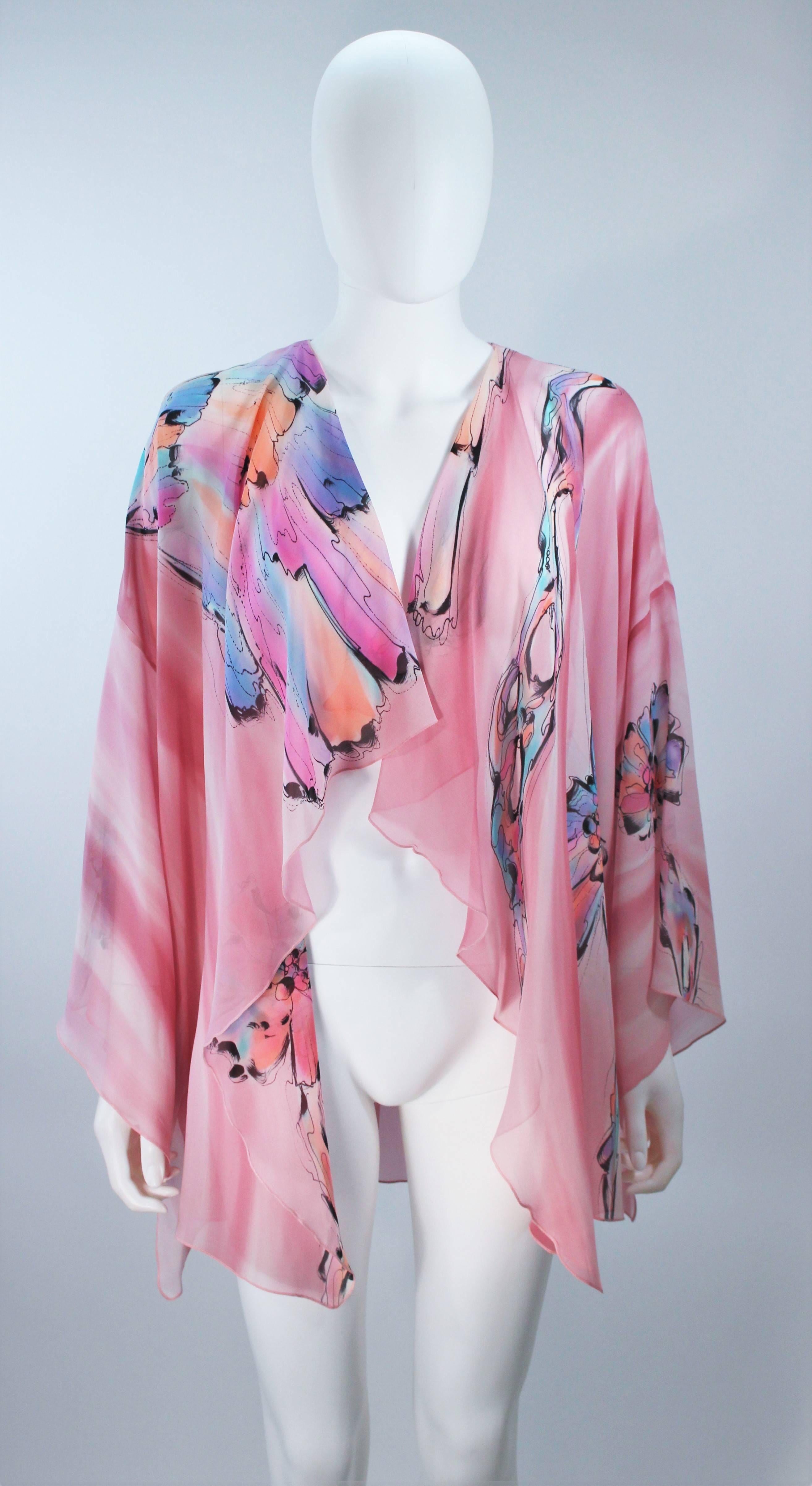 Yolanda Lorente jacket
Pink opaque silk with hand-painted design 
Elegant draping 
Dry clean only


