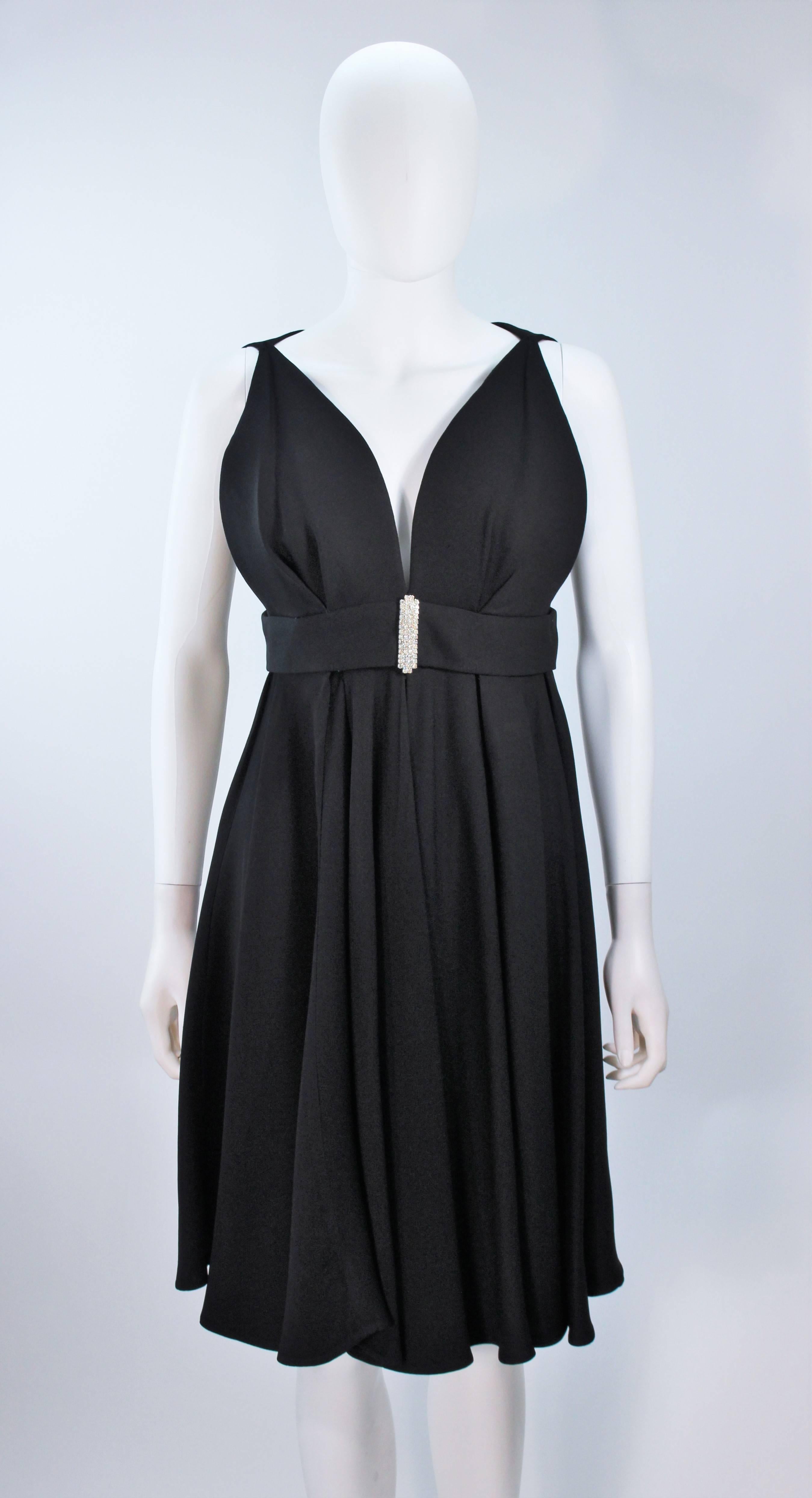 1960's Black Cocktail Dress with Rhinestone Bust Detail Size 6-8 In Excellent Condition In Los Angeles, CA