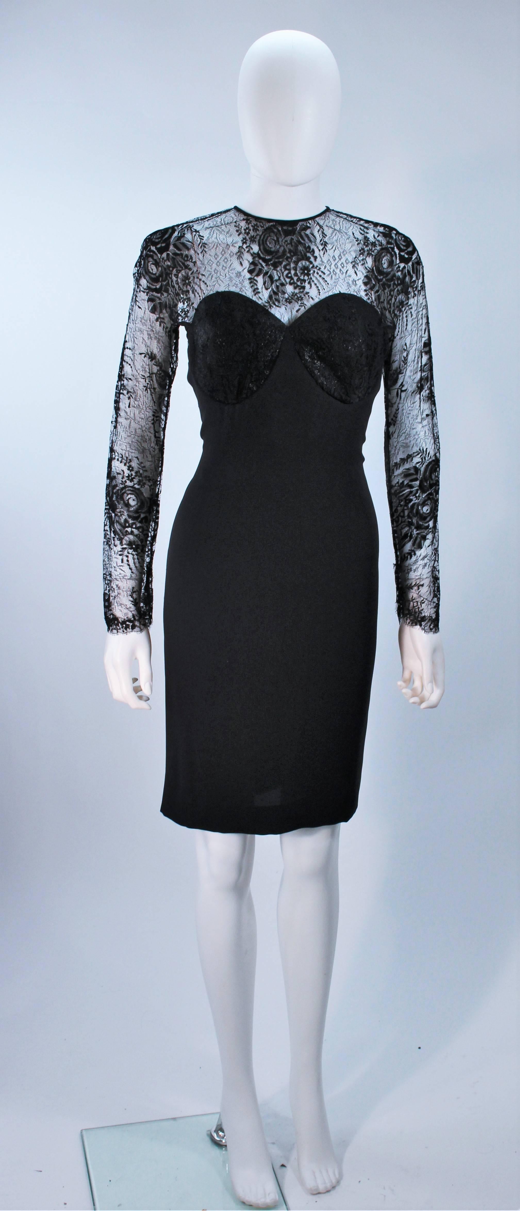 This Galanos  dress is composed of a fine black lace, with silk body, and metallic bust accent. There are scalloped edges. There is a center back zipper closure, and snaps at the sleeve end. In excellent vintage condition. 

  **Please