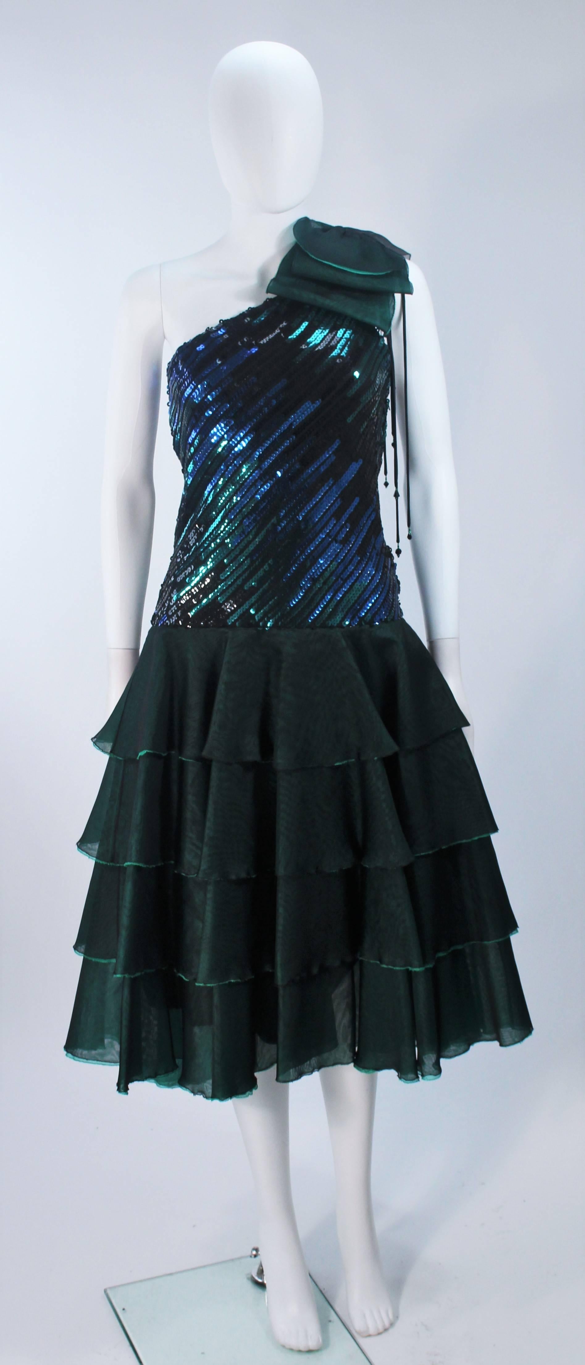  This dress is composed of a fine iridescent/multi-dimensional hue emerald green and teal silk with a sequin embellished bodice. Features an asymmetrical design with a side zipper. In excellent vintage condition. 

  **Please cross-reference