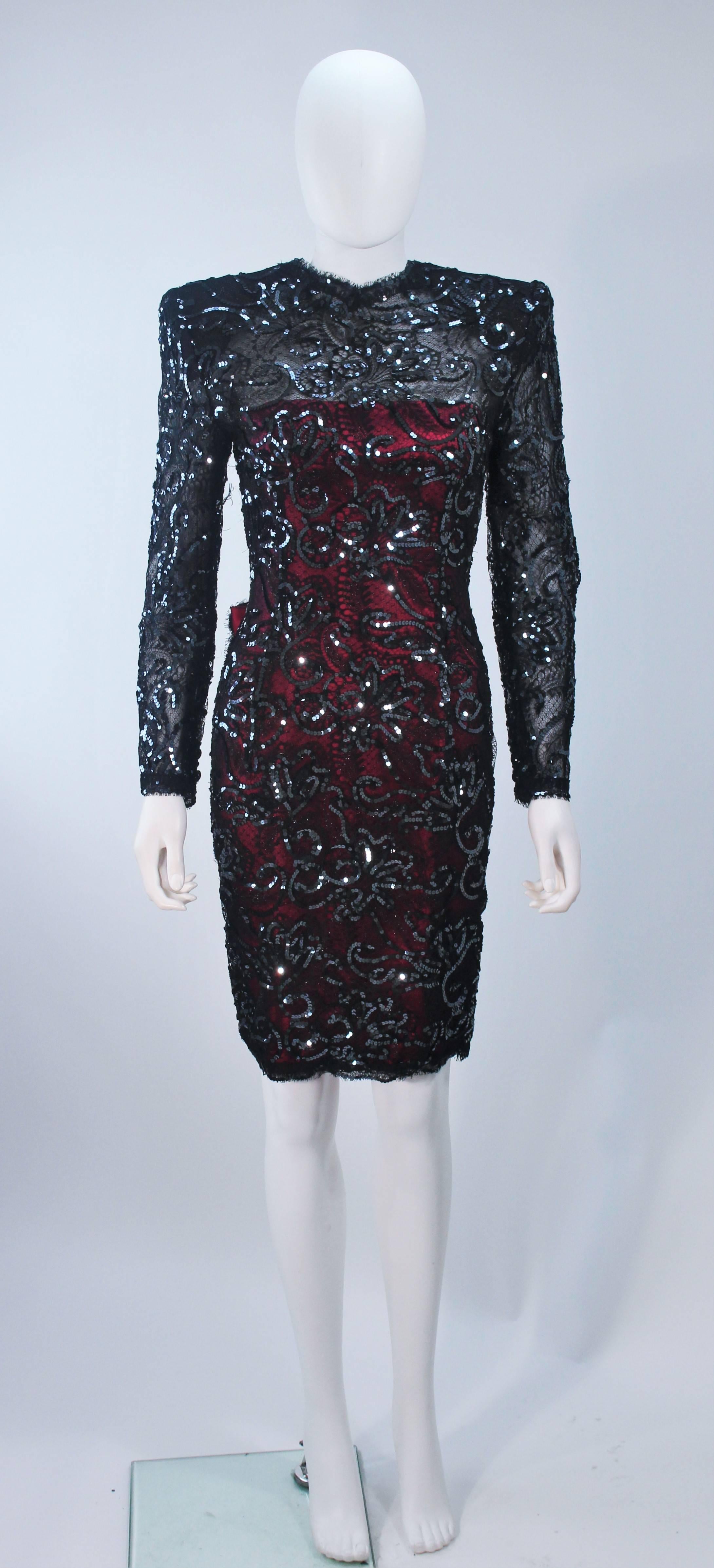  This Odicini Couture cocktail dress is composed of a sequin embellished lace with a silk magenta underlay. Features a large bow at the center back with zipper closure. In excellent vintage condition. 

  **Please cross-reference measurements for