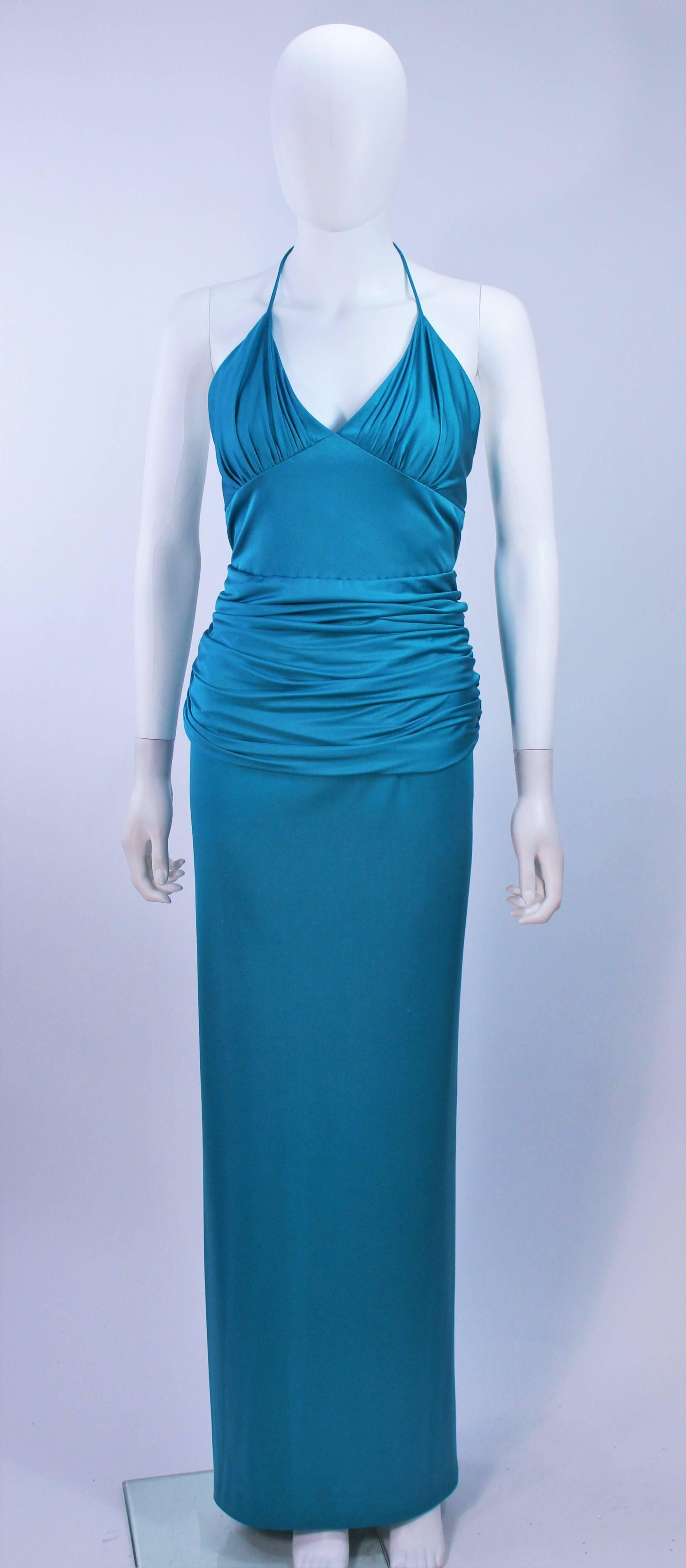 This Elizabeth Mason Couture dress is fashioned from the finest silk jersey. This fabulous halter design is effortlessly chic and can be custom made in a variety of colors. Made in Beverly Hills.

This is a couture custom order. Please allow for a