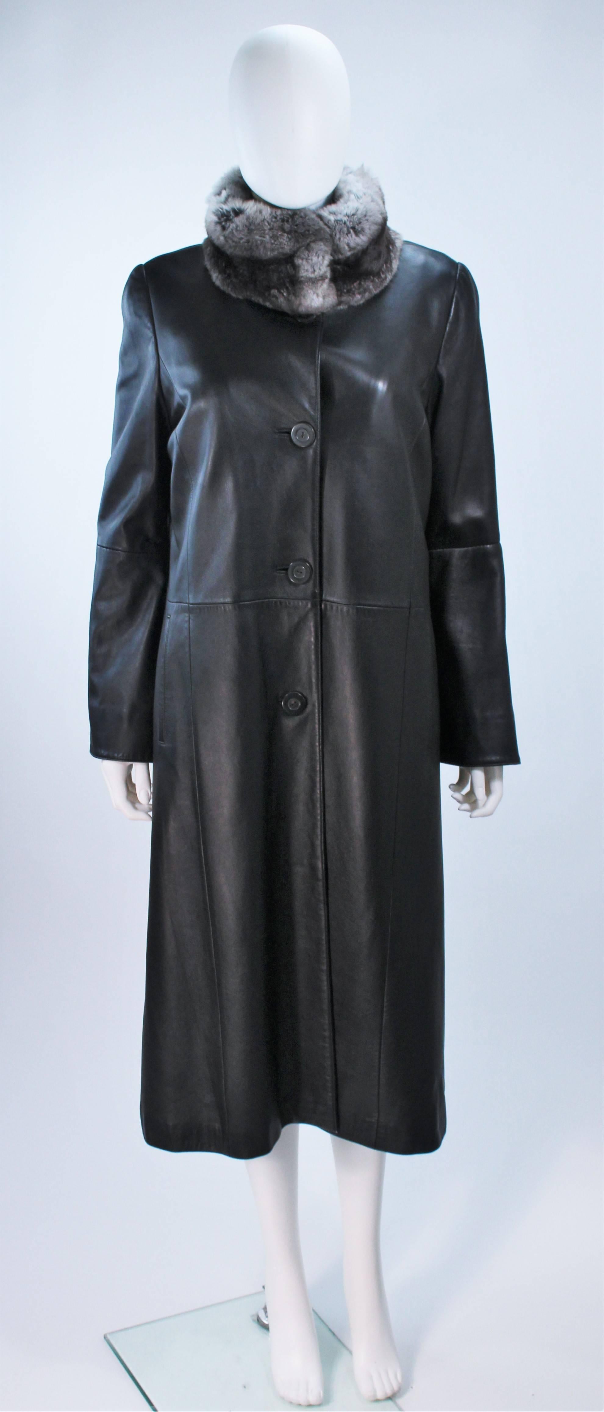  This coat is composed of a beautiful leather with a removable zip around sheared mink lining and Rex rabbit collar. There are side pockets and center front button closures. In great condition, like new. 

  **Please cross-reference measurements