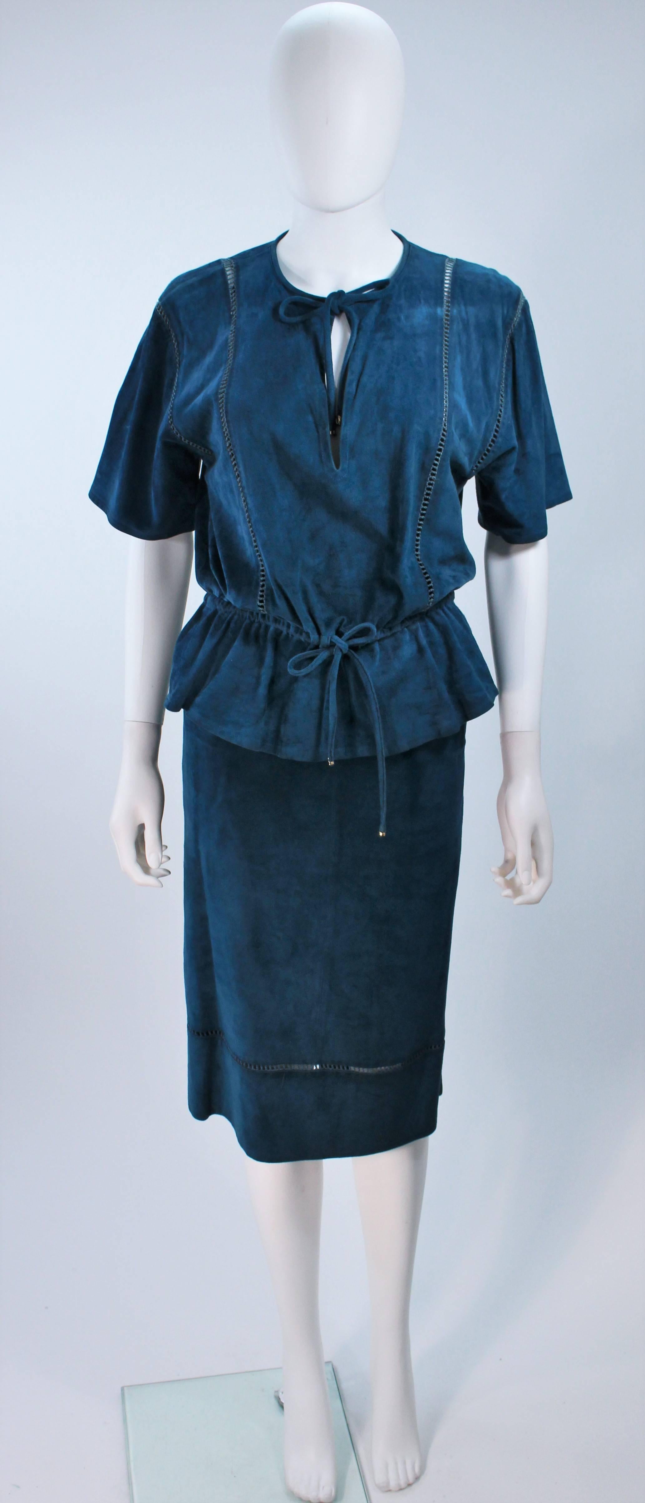  This Gucci  1970's set is composed of teal suede. The top has tie details at the neck and waist. The skirt has a center back zipper closure. In great vintage condition, some color variation. 

  **Please cross-reference measurements for personal