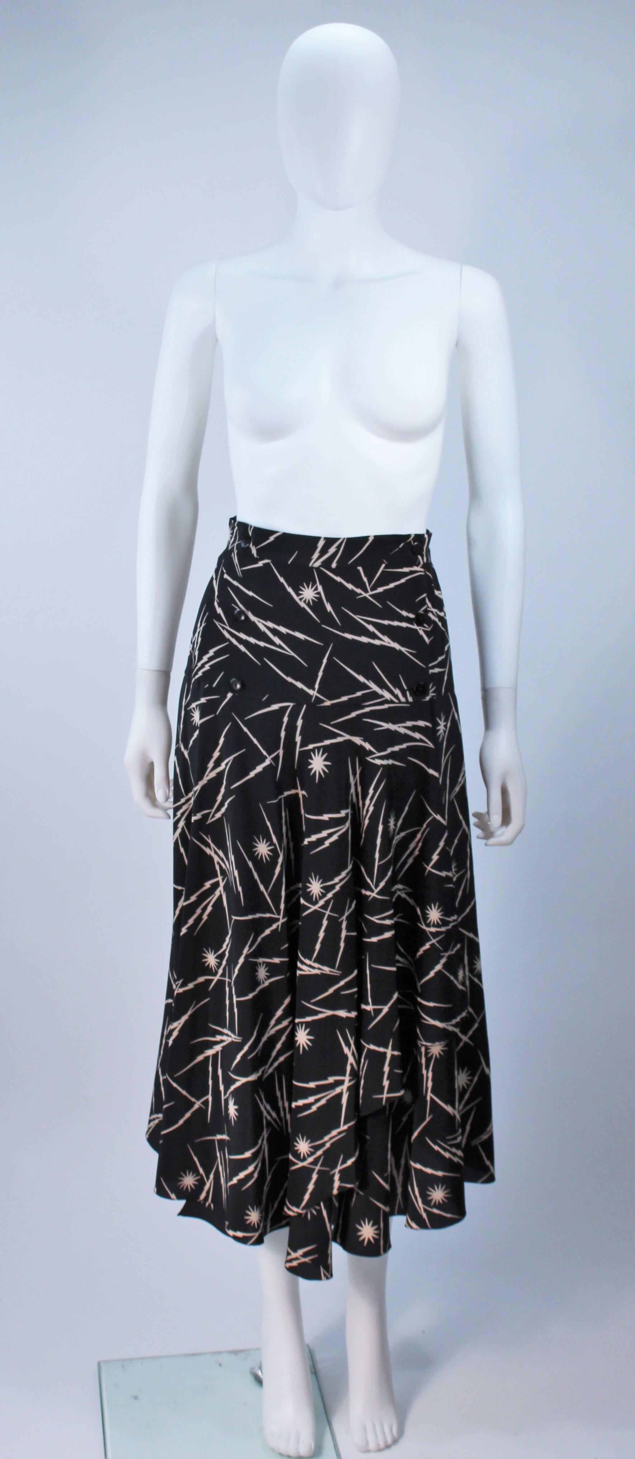  This Krizia skirt is composed of a black silk with an electrified print. Features a wrap style with button closure and panel detail. In great vintage condition. 

  **Please cross-reference measurements for personal accuracy. Size in description