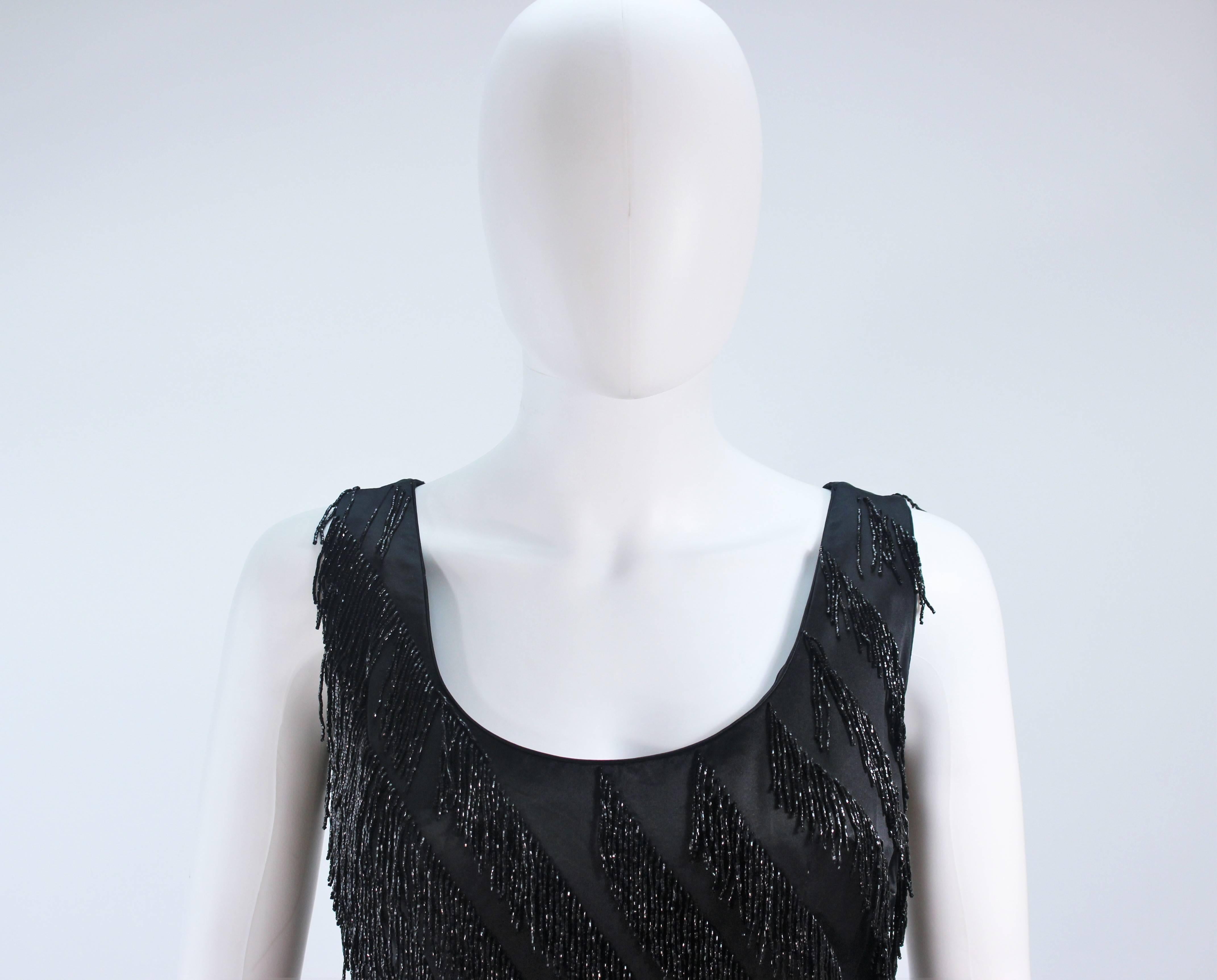 PAULINE SHEN Schwarzes asymmetrisches perlenbesetztes Fransenkleid aus Seide Größe 2 4 Damen im Angebot