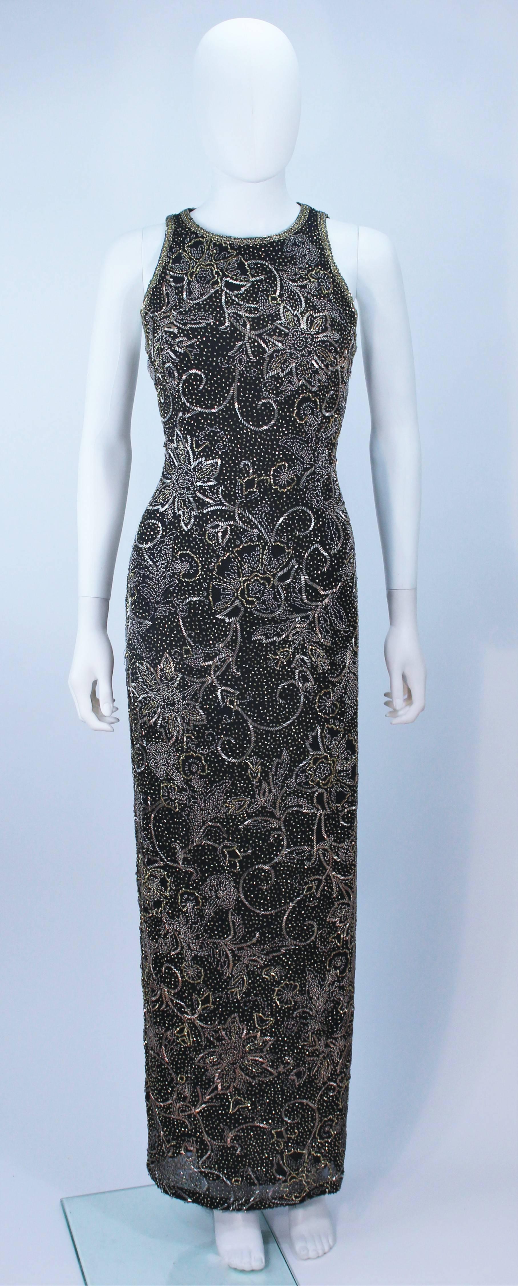  This Oleg Cassini  gown is composed of a black silk with gold, black, and silver beading. Features a racer style neckline with center back zipper closure. In great vintage condition. 

  **Please cross-reference measurements for personal