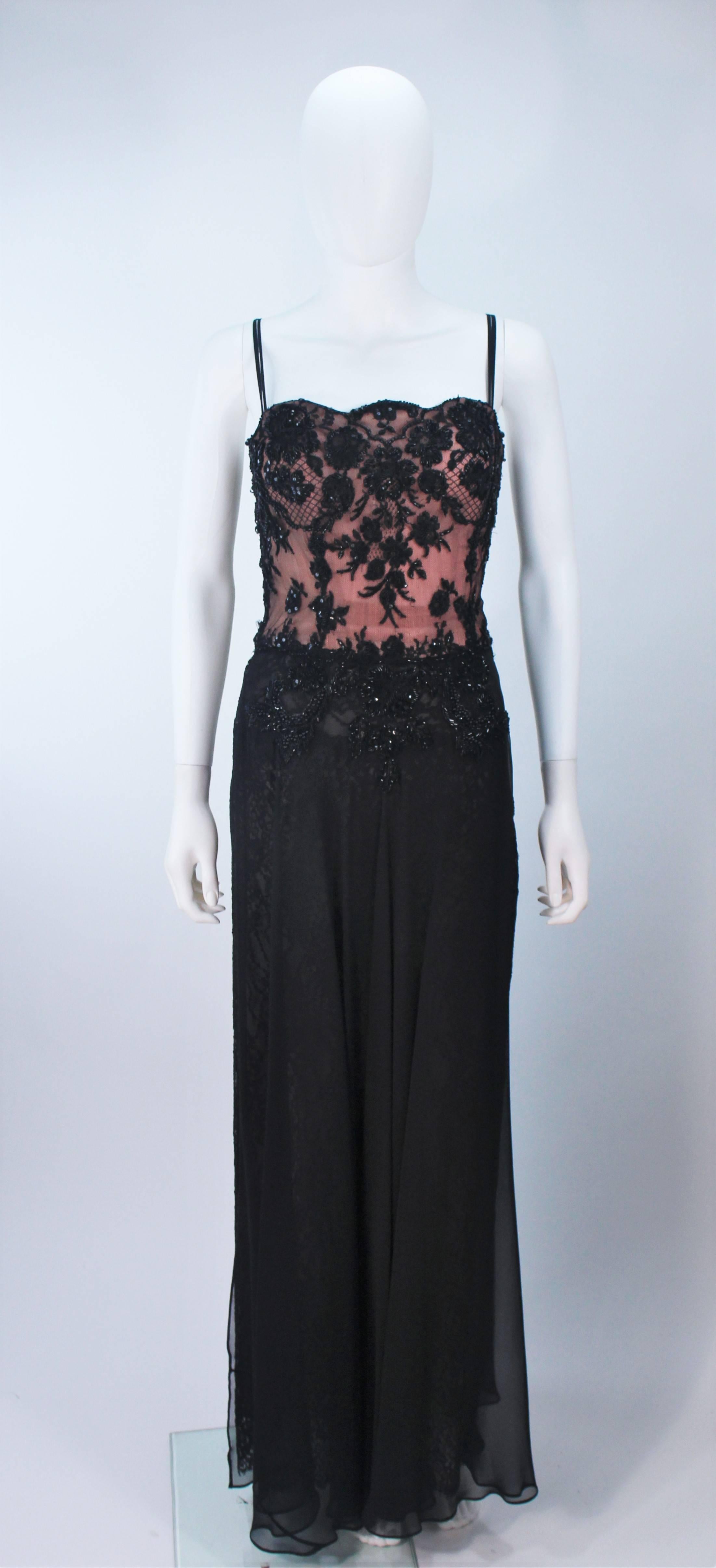 This Fe Zandi gown is composed of a black chiffon and beaded lace with a nude underlay. Features a front sheer chiffon drape, with lace,  and center back zipper closure. In excellent vintage condition.

  **Please cross-reference measurements for