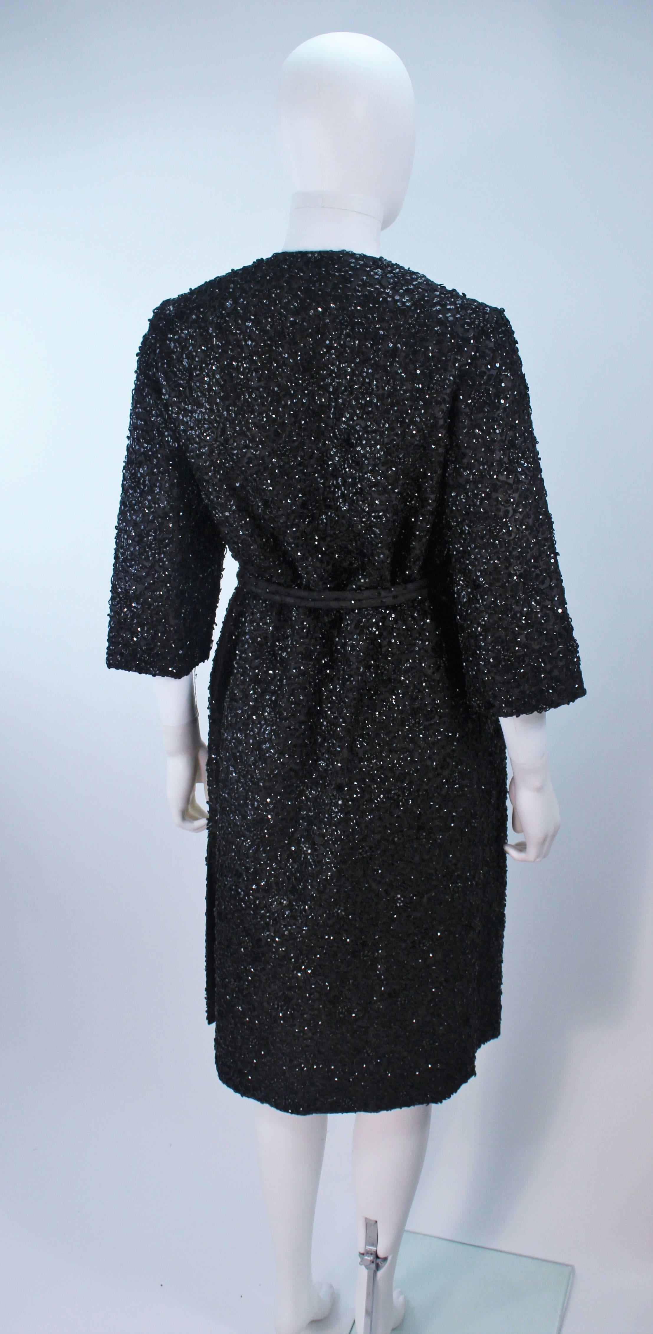 HAUTE COUTURE INTERNATIONAL 1960's Black Beaded Sequin Coat with Belt Size 6 For Sale 3