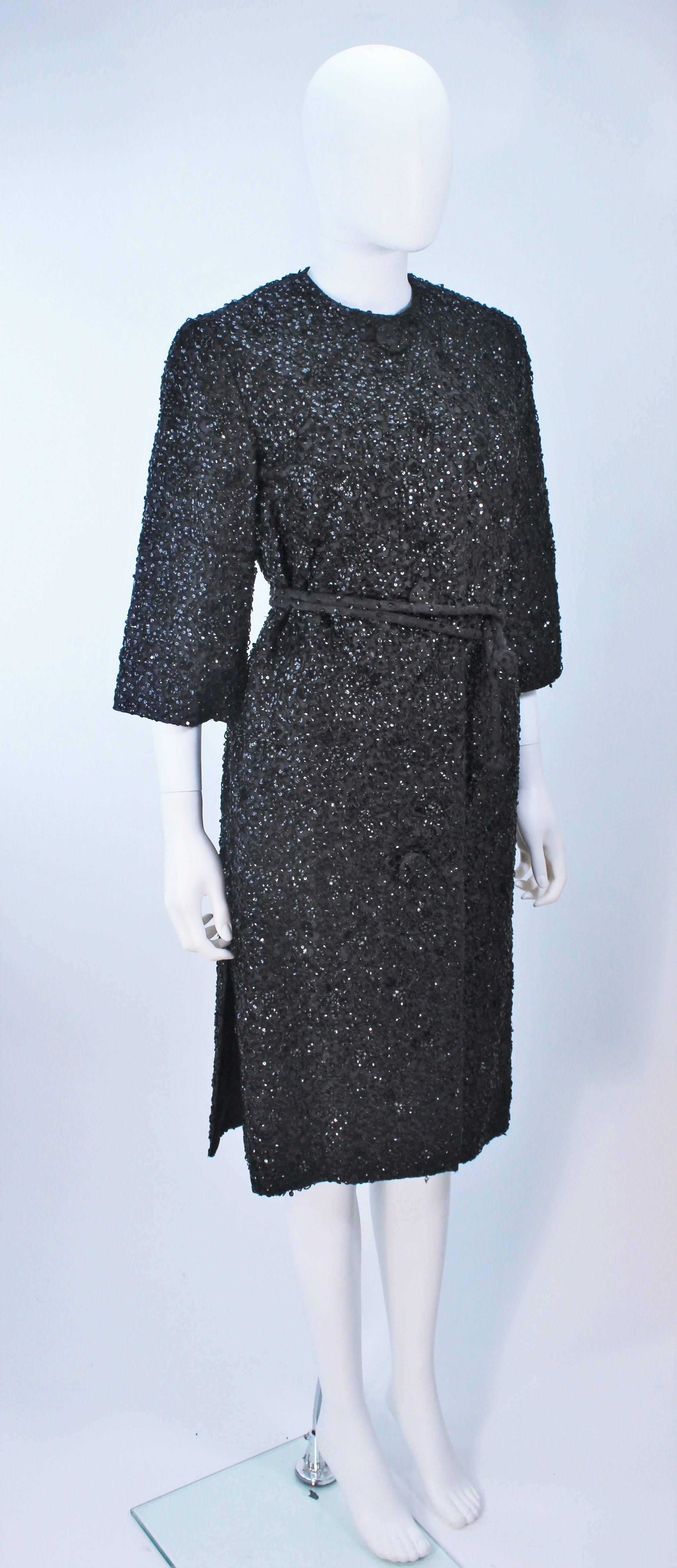HAUTE COUTURE INTERNATIONAL 1960's Black Beaded Sequin Coat with Belt Size 6 For Sale 1