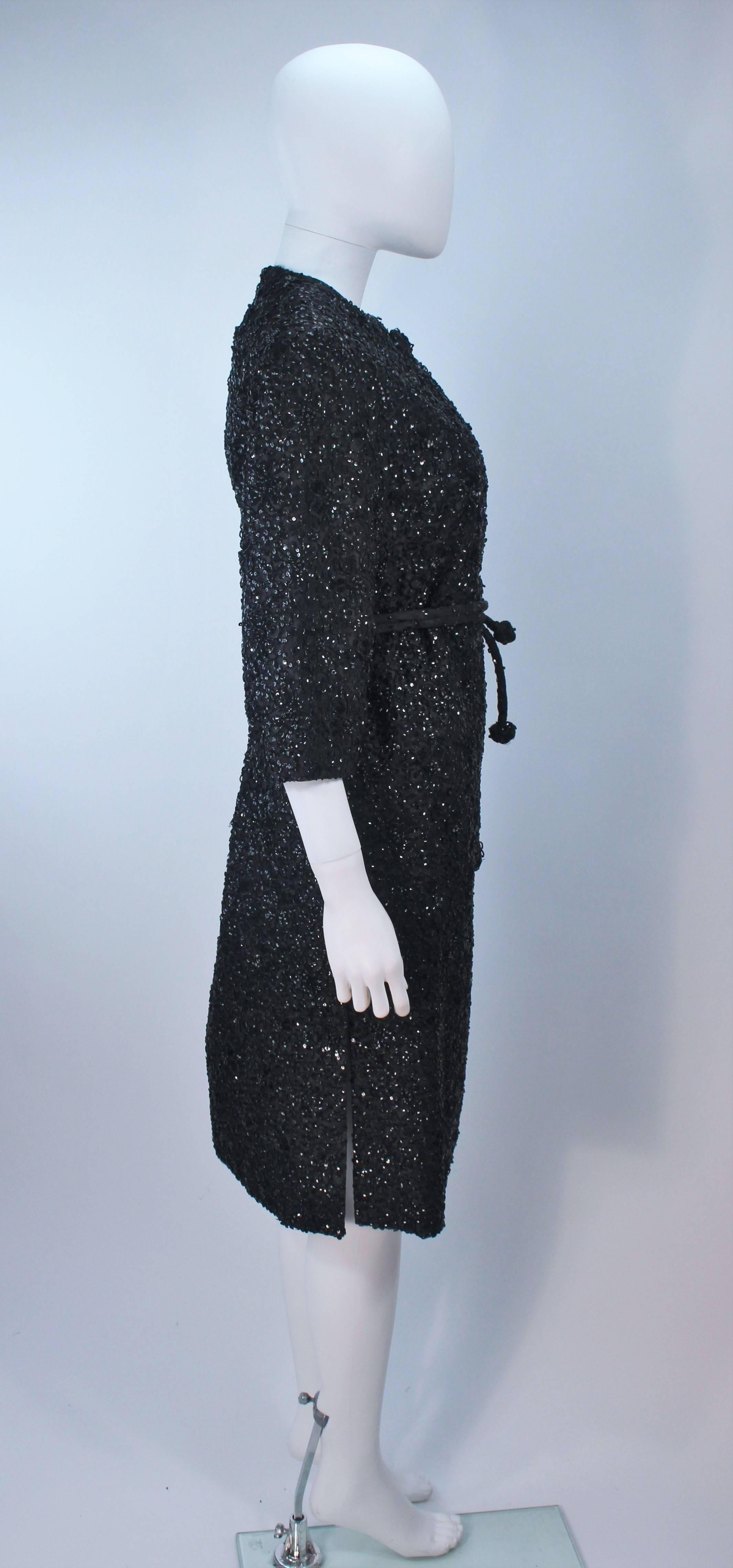 HAUTE COUTURE INTERNATIONAL 1960's Black Beaded Sequin Coat with Belt Size 6 For Sale 2
