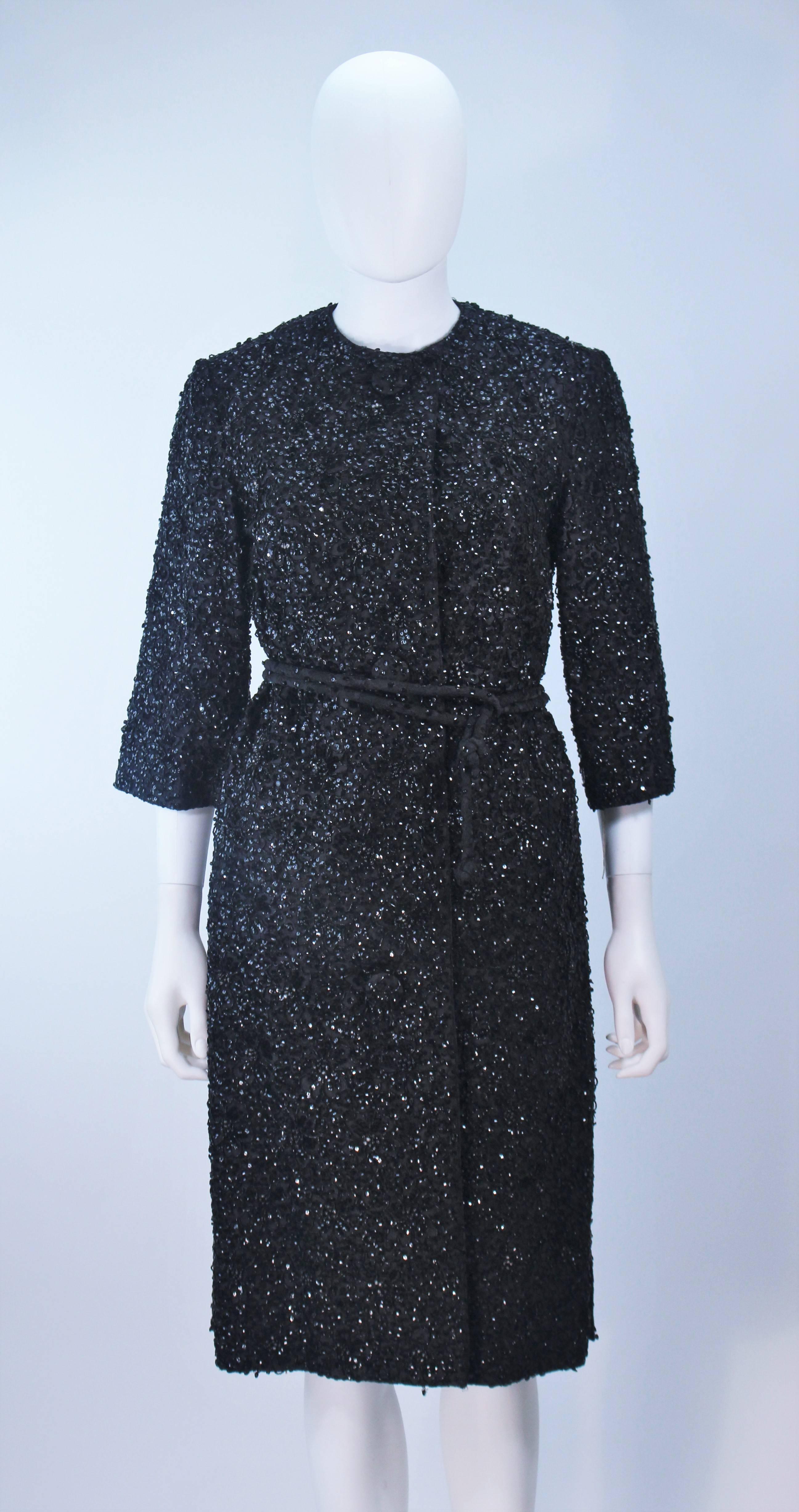 HAUTE COUTURE INTERNATIONAL 1960's Black Beaded Sequin Coat with Belt Size 6 In Excellent Condition For Sale In Los Angeles, CA