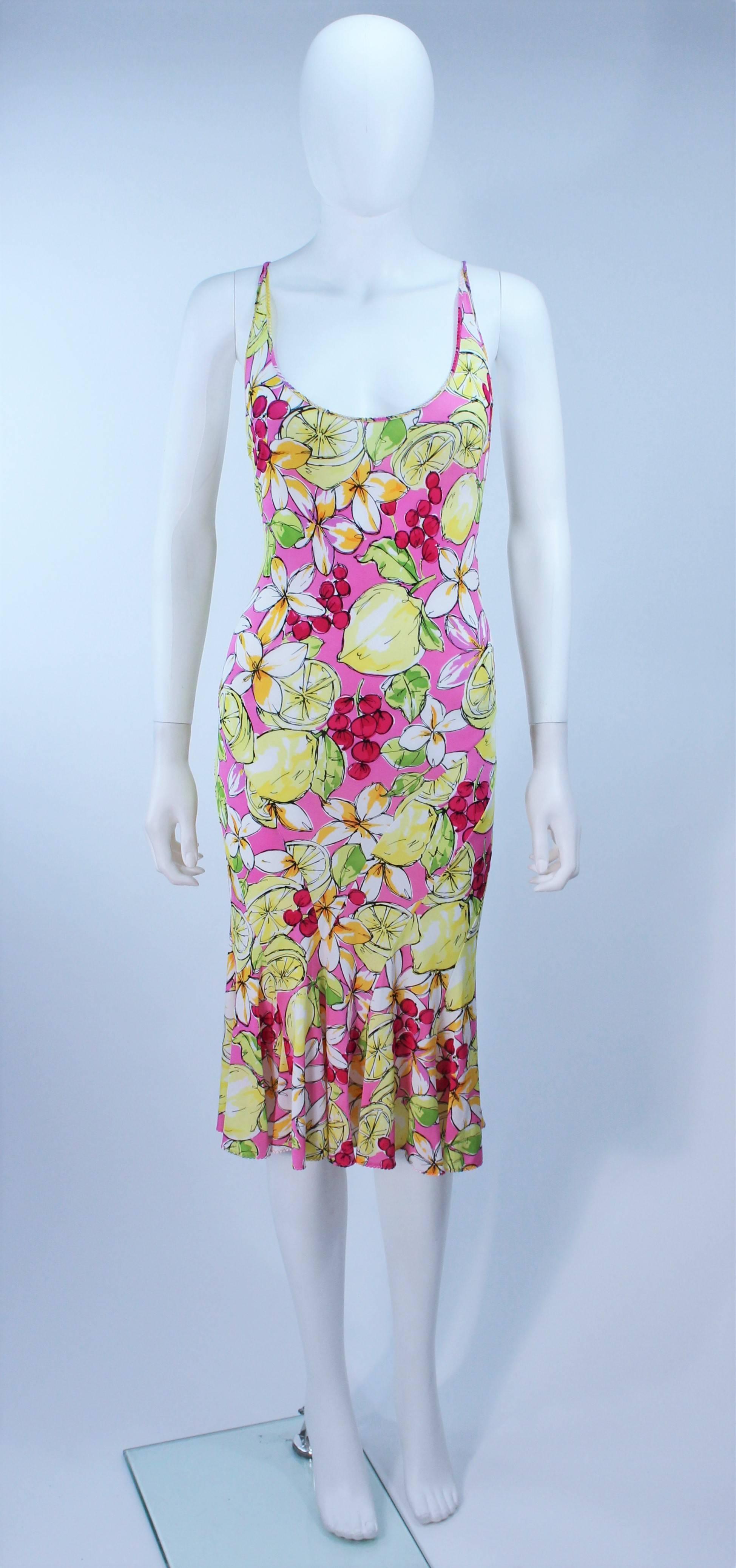 This Blumarine cocktail dress is composed of a stretch lightweight lemon and cherry print fabric. In excellent vintage condition.

  **Please cross-reference measurements for personal accuracy. 

Measures (Approximately)
Length: 36.5