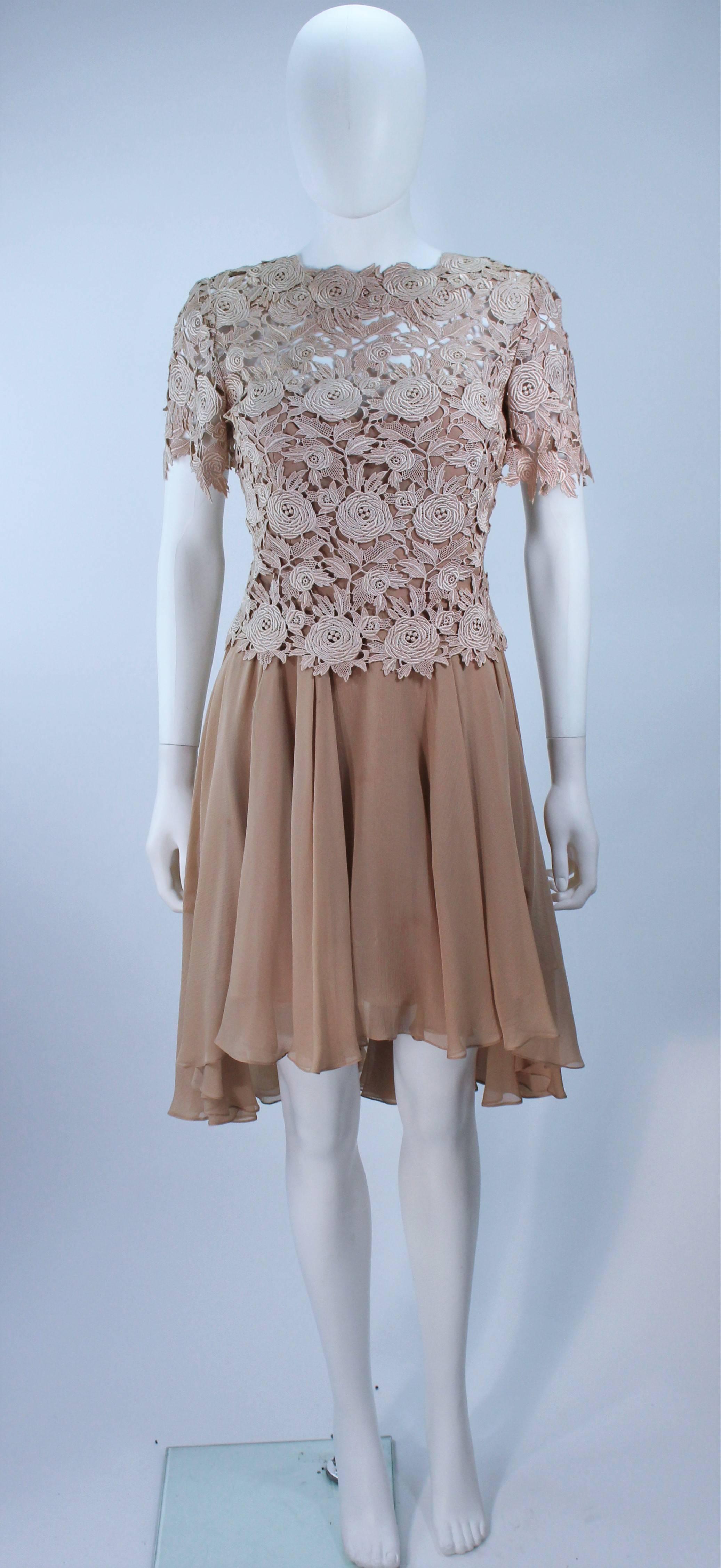 This Travilla  dress is composed of a nude floral lace and chiffon combination, with scalloped edge. There is a center back zipper closure. In excellent vintage condition.

  **Please cross-reference measurements for personal accuracy.