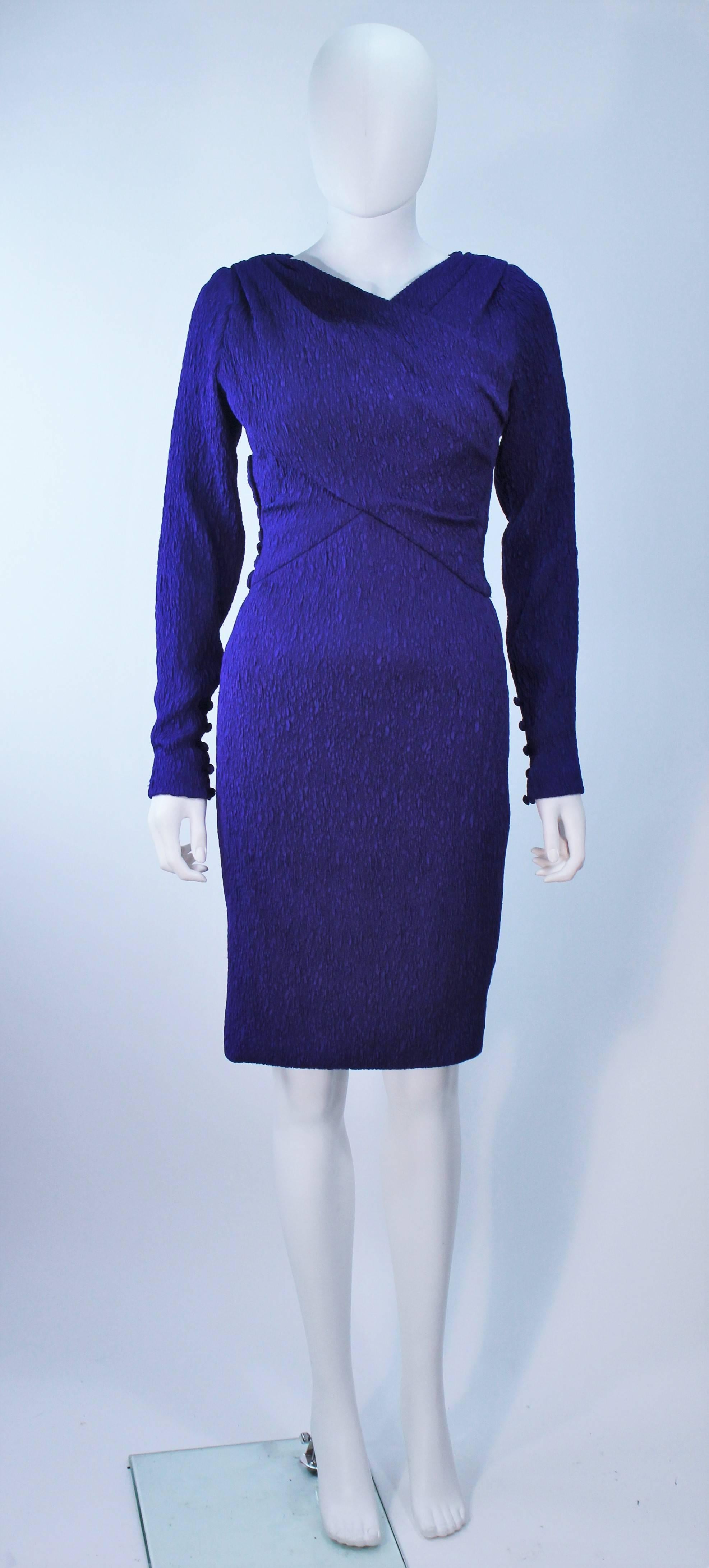 This Christian Dior purple silk dress dress features is draped and ruched with a side zipper closure, snaps, and hook & eyes. There is a boned interior. 
In excellent condition. 
Made in France. 

Provenance: Betsy Bloomingdale
 
  **Please