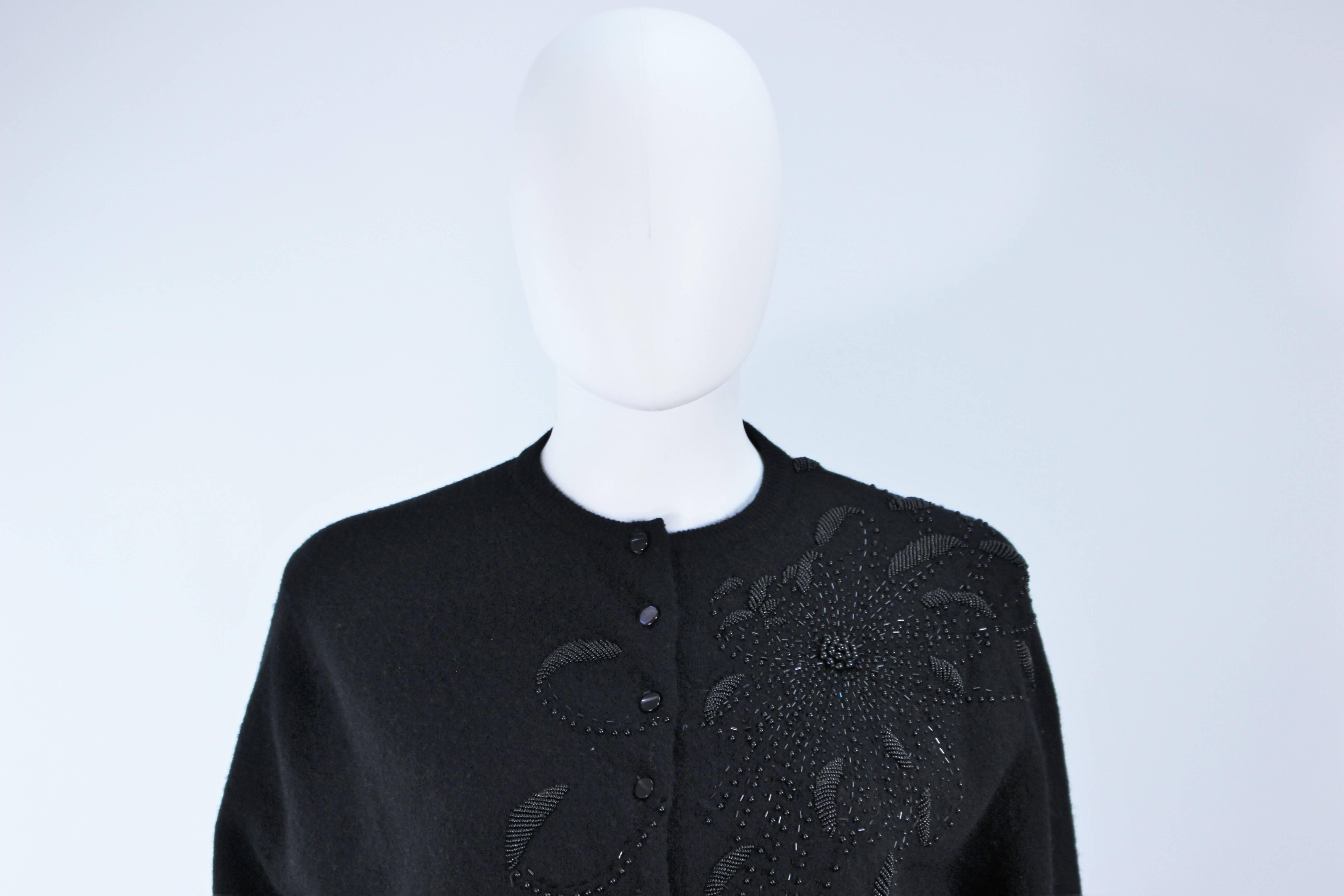 SCHIAPARELLI Black Wool Starburst Beaded Sweater Size Medium In Excellent Condition In Los Angeles, CA