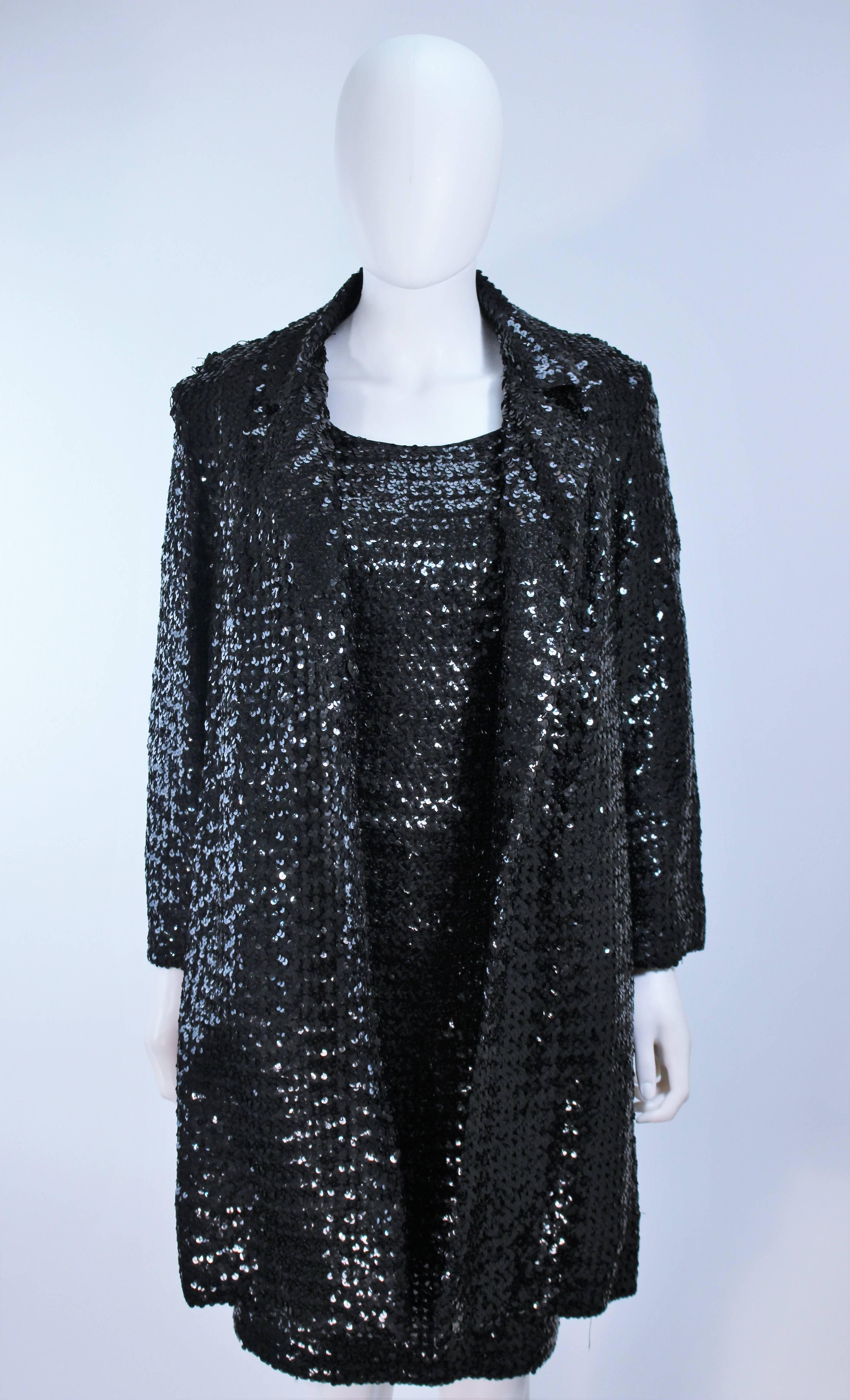 This Sa'Bett California  ensemble is composed of a black sequins. The dress has a center back zipper closure. The coat is an open style. In Excellent vintage condition.

  **Please cross-reference measurements for personal accuracy. Size in