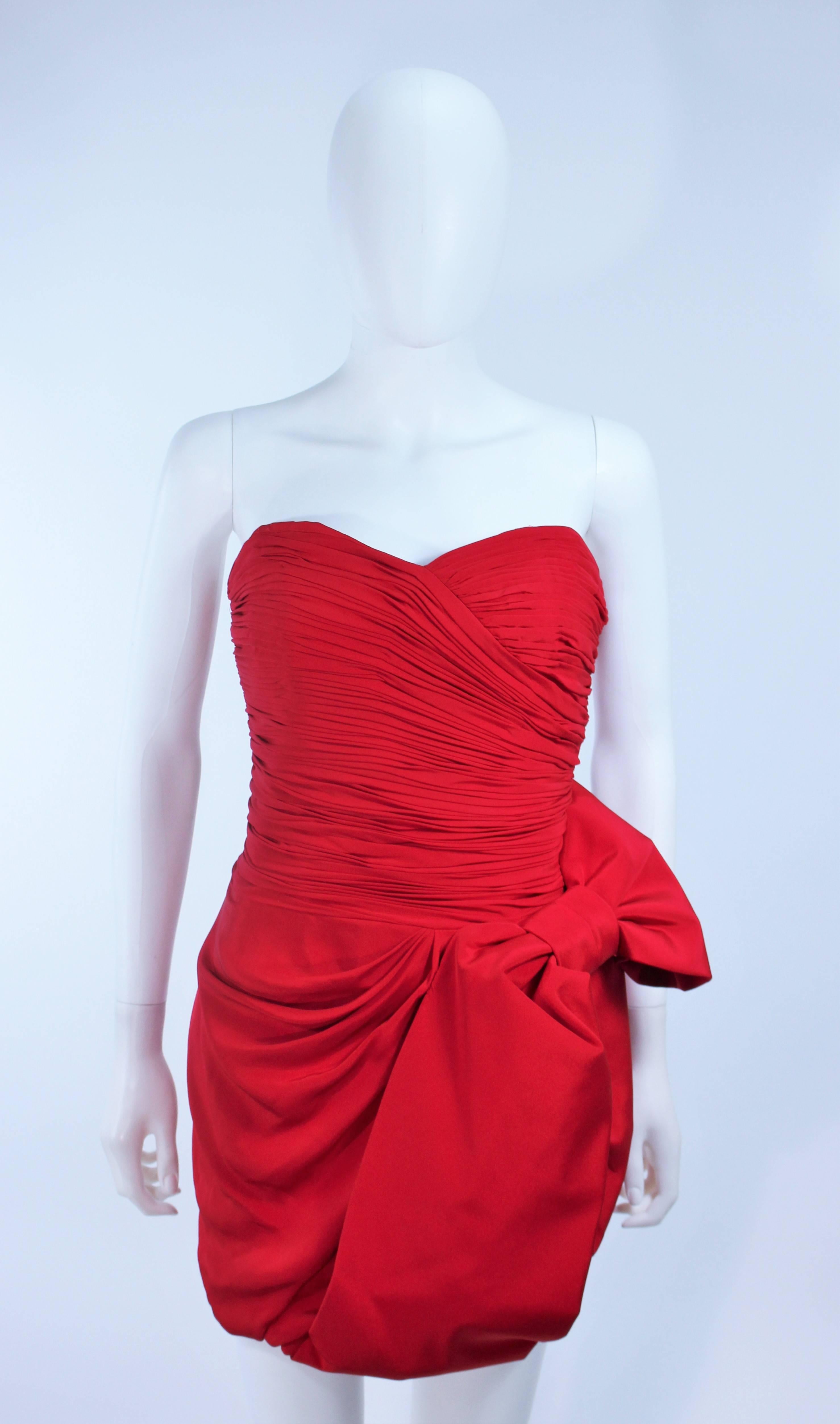 MARCHESA NOTTE Lippenstiftrotes Cocktailkleid mit Schleife Größe 6 (Rot) im Angebot