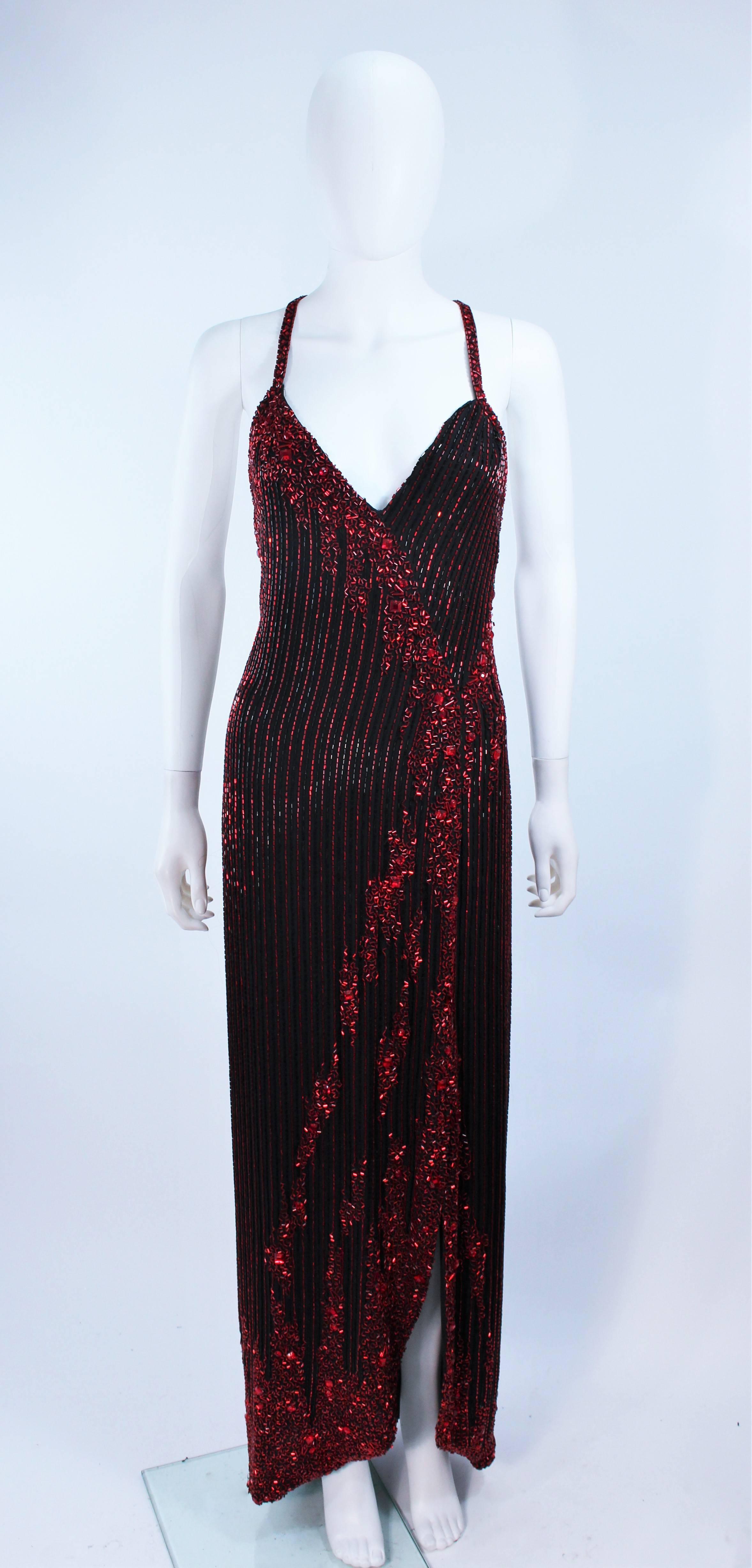 This Bob Mackie  gown is composed of an embellished silk with red beading. Features a racer style halter with dropped back and center back zipper. Excellent vintage condition.

This gown is the same model as seen on Brooke Shields on the cover of