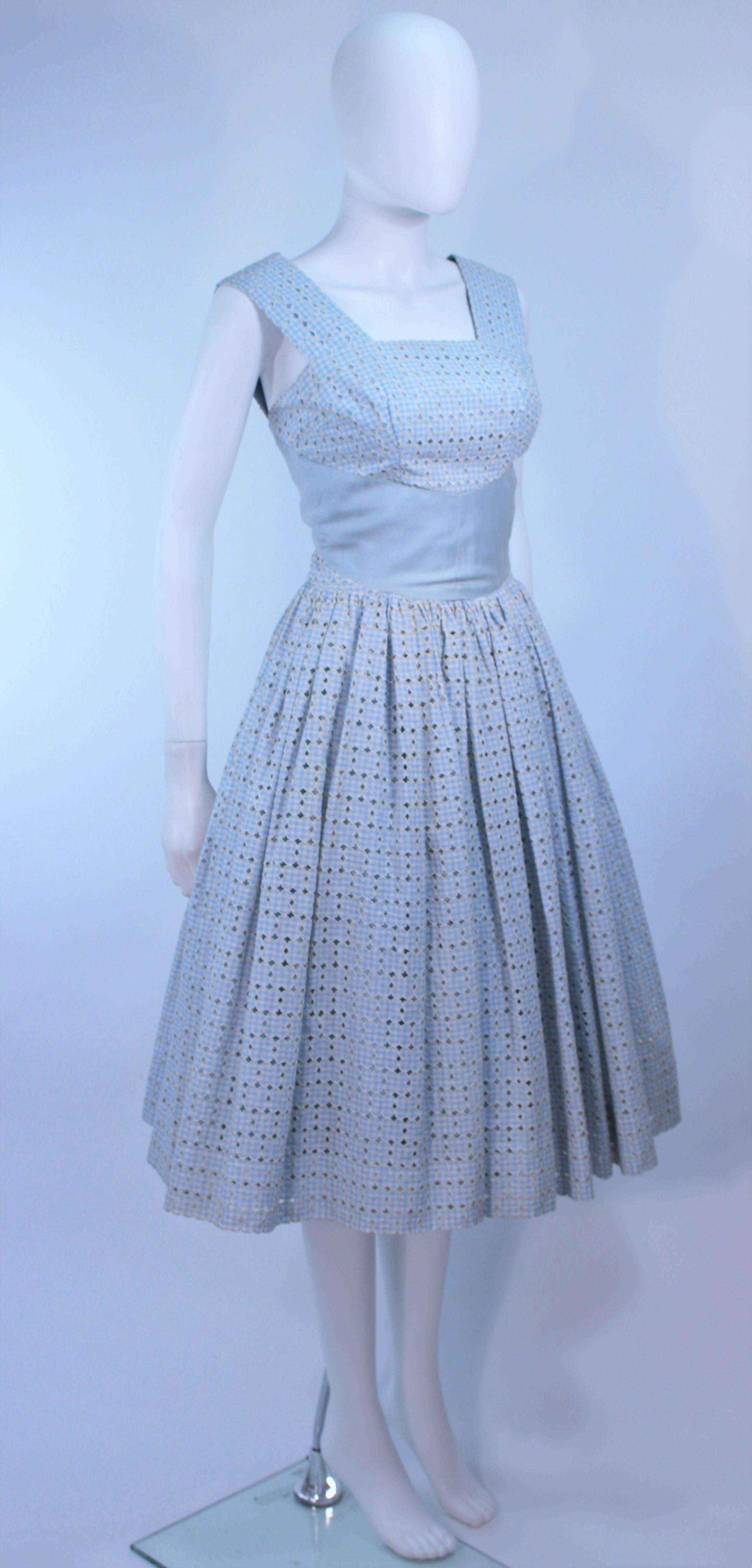 Vintage 1950's Blue and White Eyelet Dress Size 2 In Excellent Condition For Sale In Los Angeles, CA