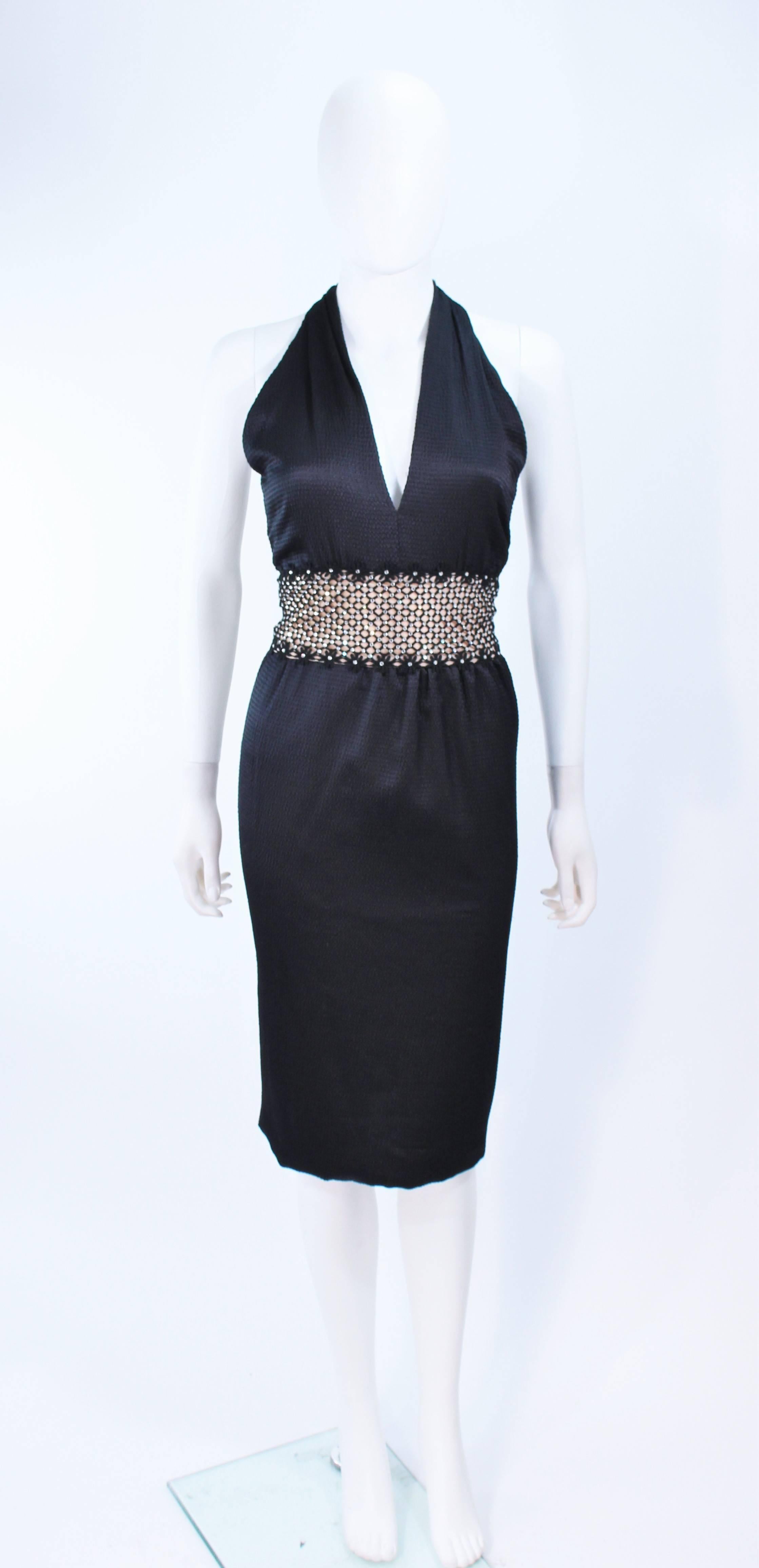 This Robert David-Morton design is composed of a textured silk with a nude embellished lace waist. Features a halter neck with zipper closure. In excellent vintage condition.

**Please cross-reference measurements for personal accuracy. Size in
