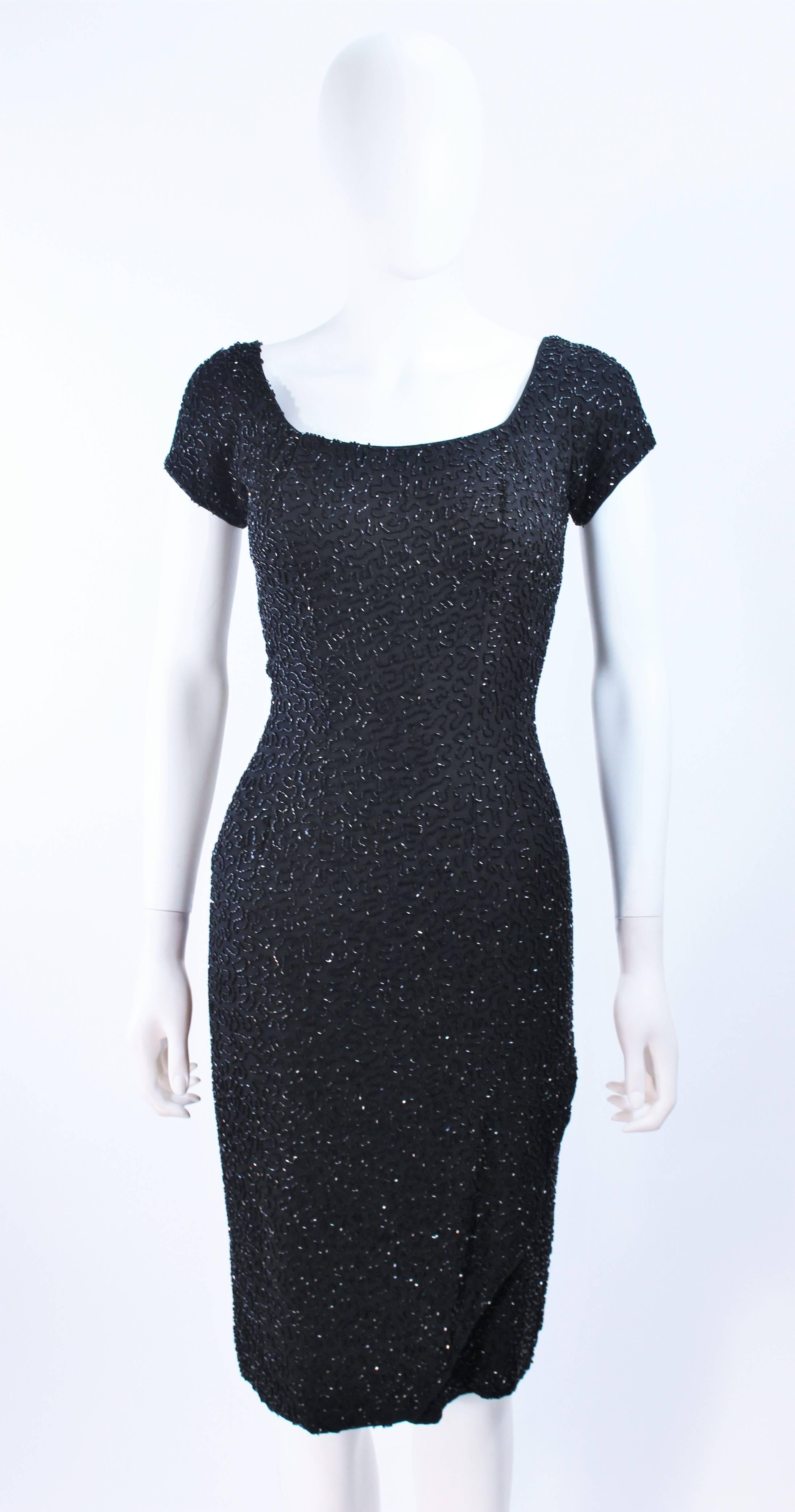 CEIL CHAPMAN 1960's Black Hand Beaded Silk Cocktail Dress with Drape Size 4  In Excellent Condition For Sale In Los Angeles, CA