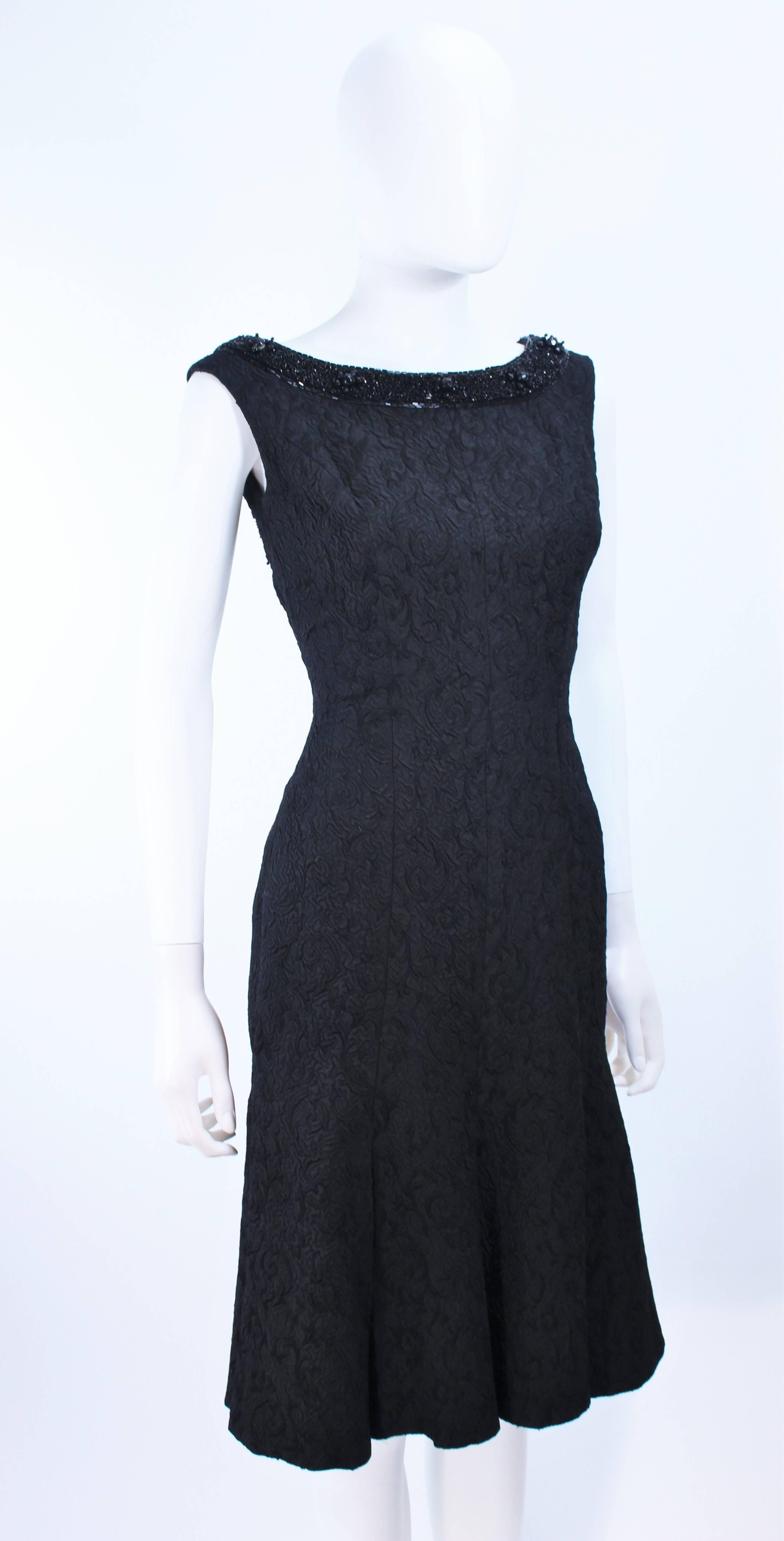 Women's Vintage 1960's Black Brocade Cocktail Dress with Beaded Neckline Size 2 For Sale