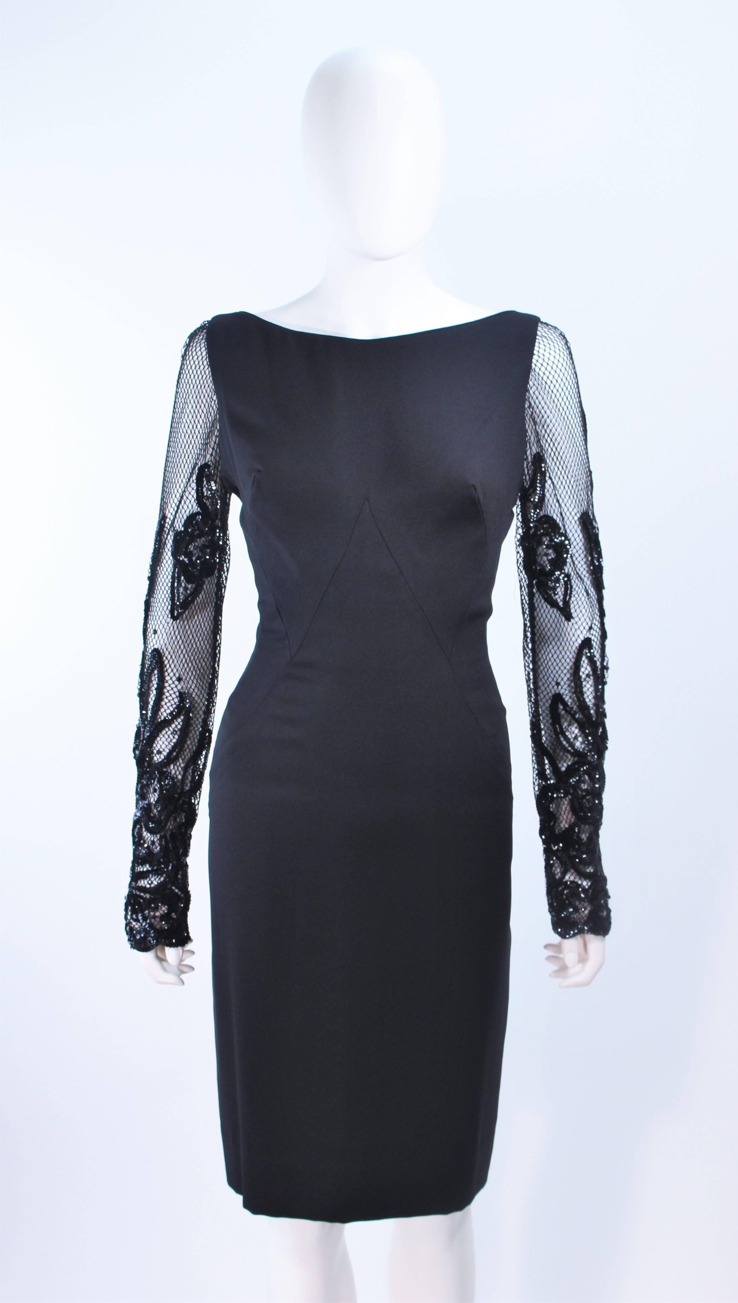 black dress with mesh sleeves