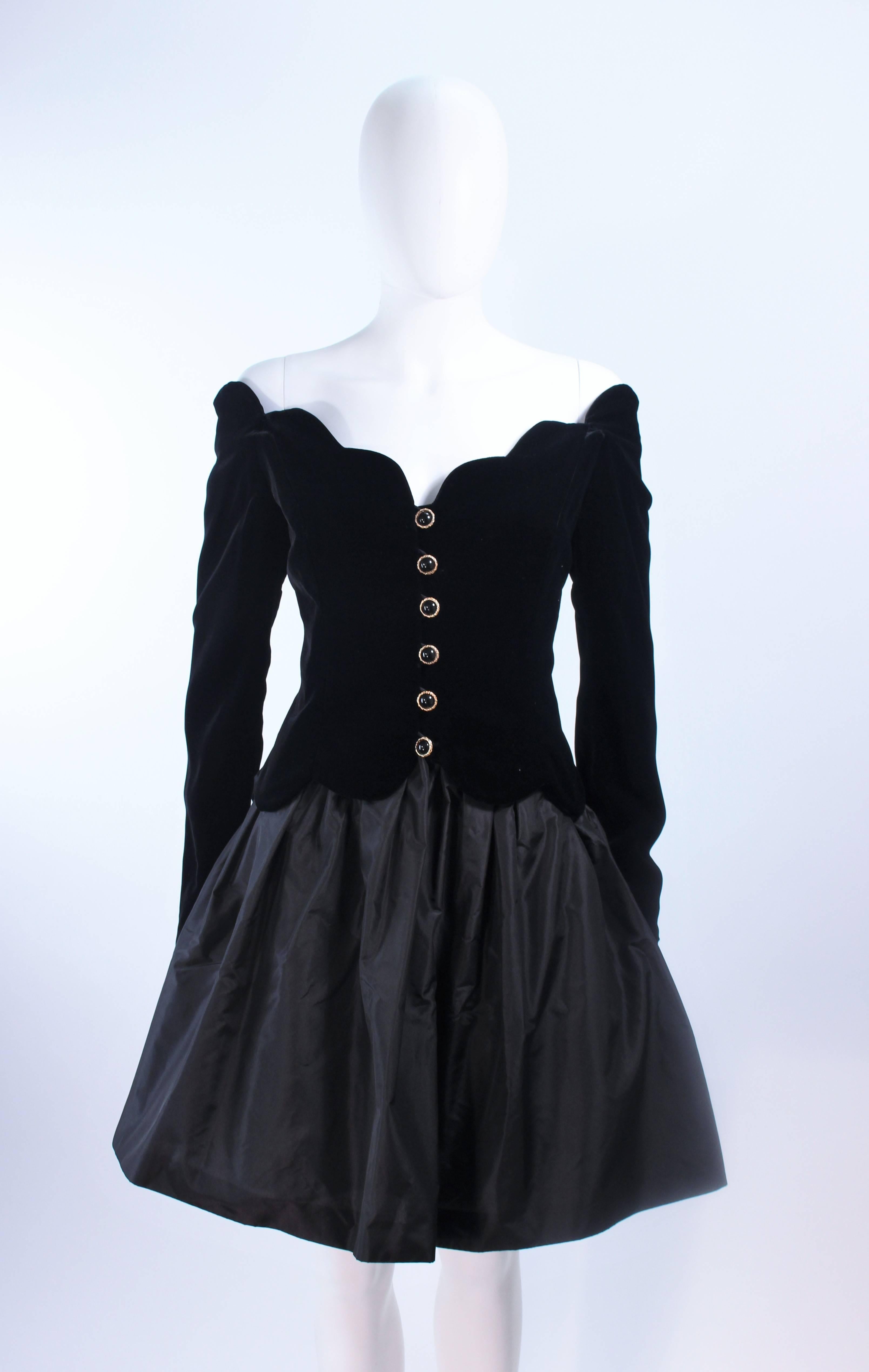 This Belville Sasson ensemble is composed of silk and velvet. Features an off the shoulder scalloped blouse and a taffeta skirt. There are center front buttons on the blouse and a zipper closure on the skirt. In excellent vintage