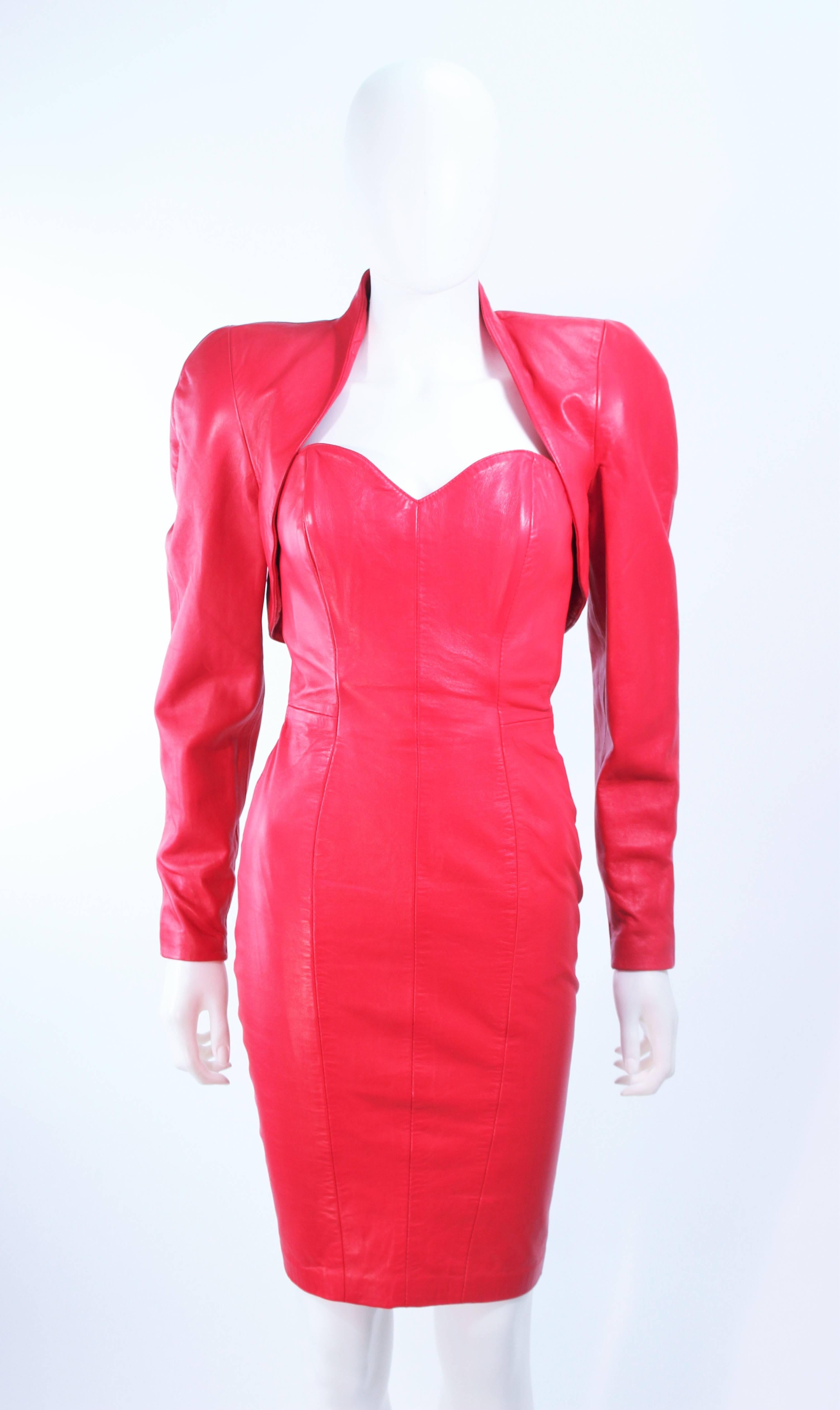 This Micheal Hoban set is composed of a red leather. Comes with bolero jacket which has an open style with no closure. The dress has a center back zipper . In excellent vintage condition.

**Please cross-reference measurements for personal