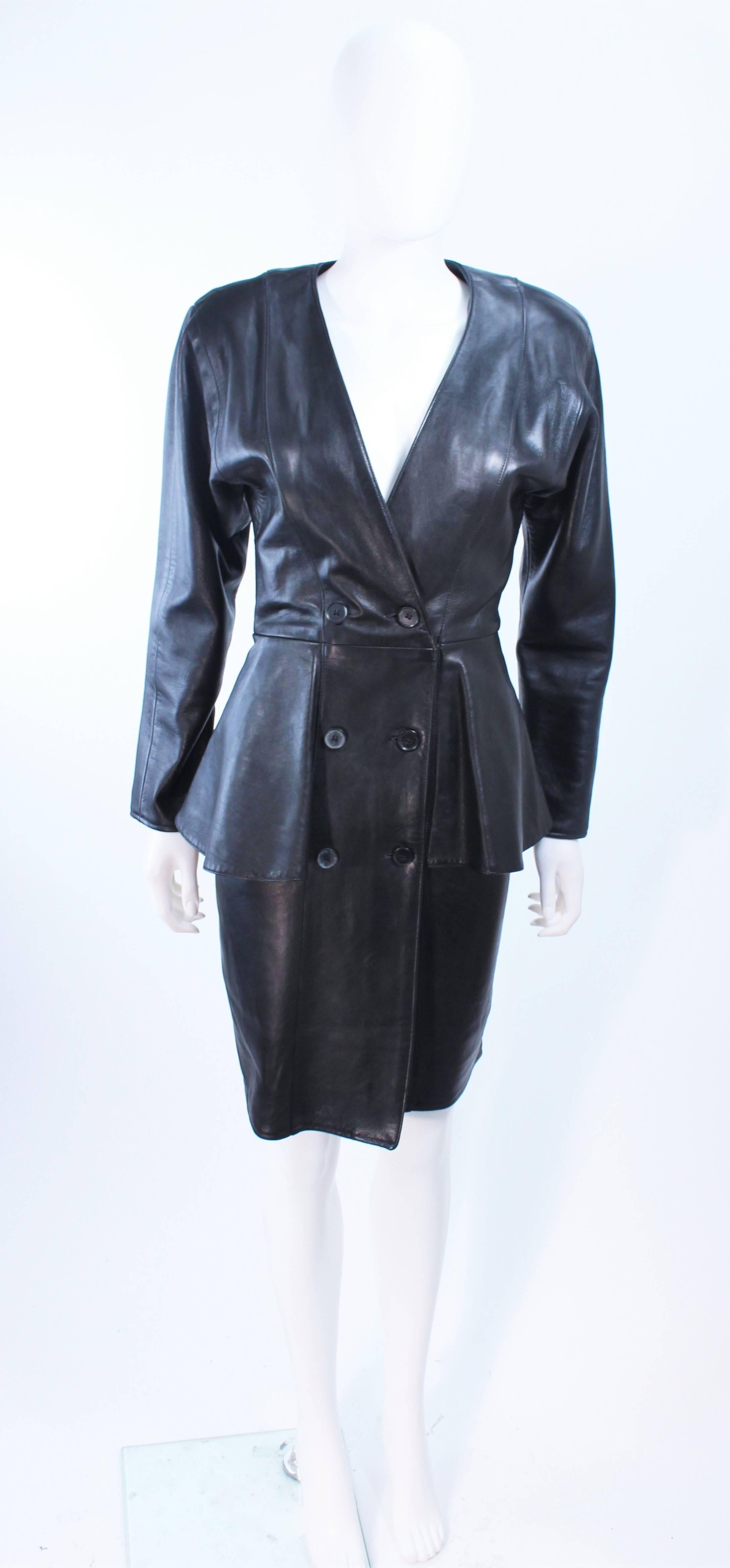 This Vakko design is composed of a phenomenal leather. The classic style with a flair features center front button closures and a peplum waist flare. In excellent vintage condition.

**Please cross-reference measurements for personal accuracy.