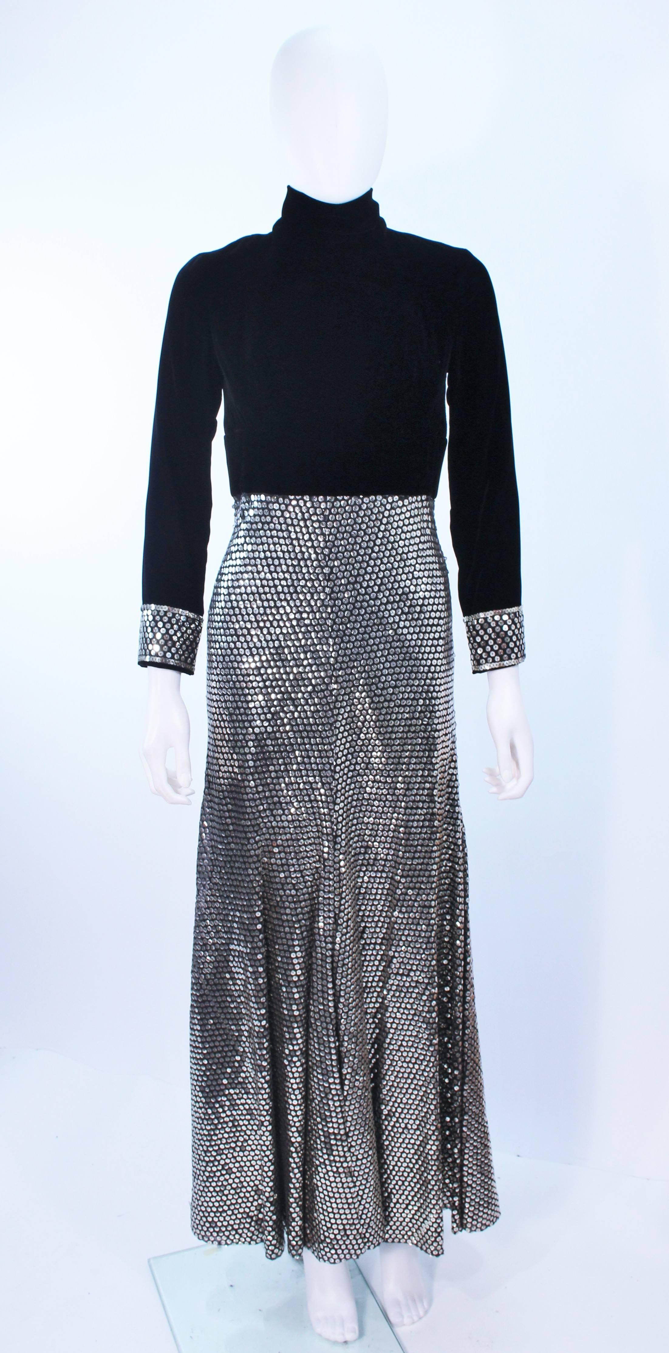 This vintage gown is composed of black velvet and features sequin accents. There is a center back zipper closure with button details, and a mockneck. In excellent vintage condition.

**Please cross-reference measurements for personal accuracy.