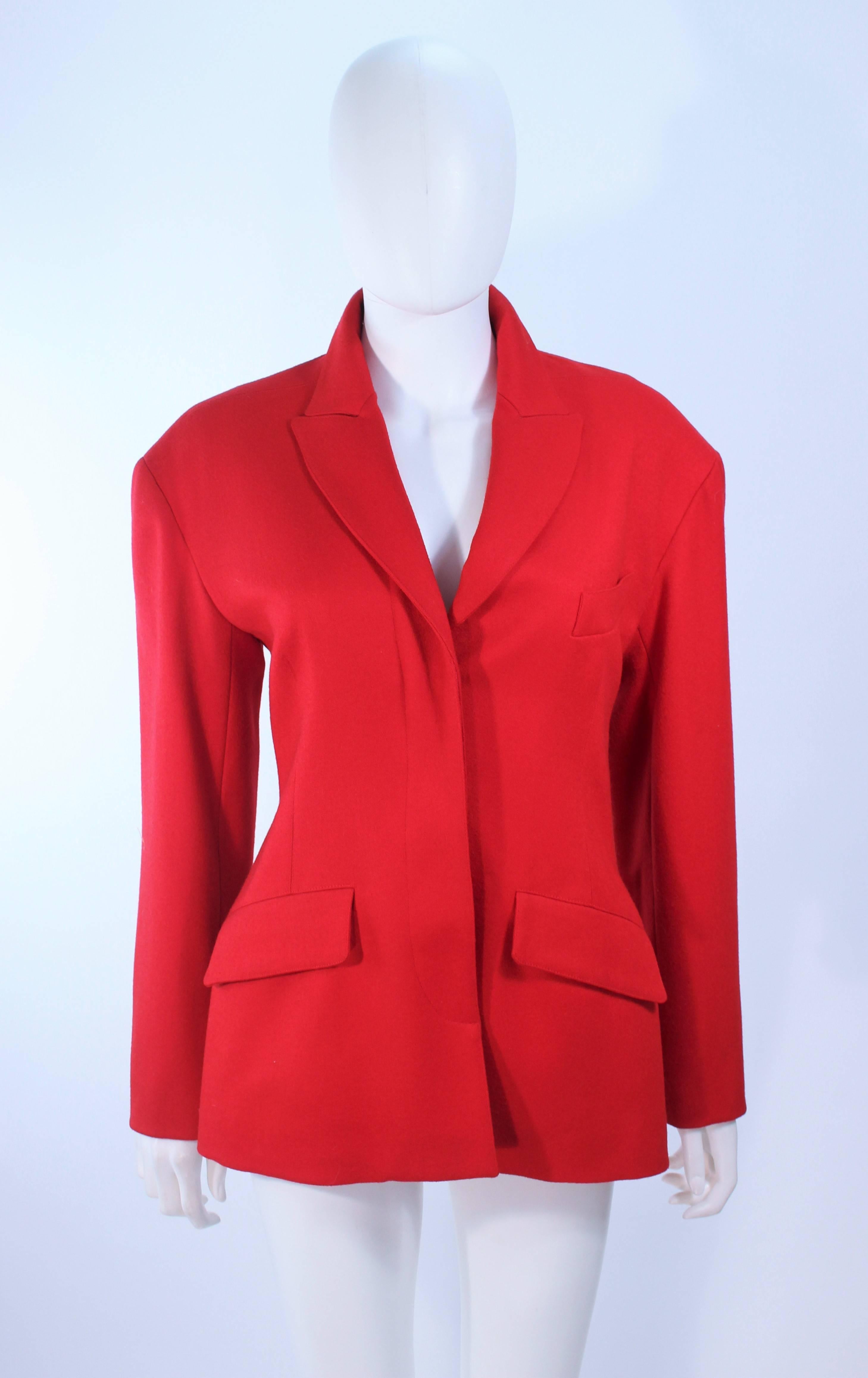 This Alaia jacket is composed of a red fabric. There are center front buttons and pocket details. In excellent vintage condition.

**Please cross-reference measurements for personal accuracy. Size in description box is an estimation.

Measures