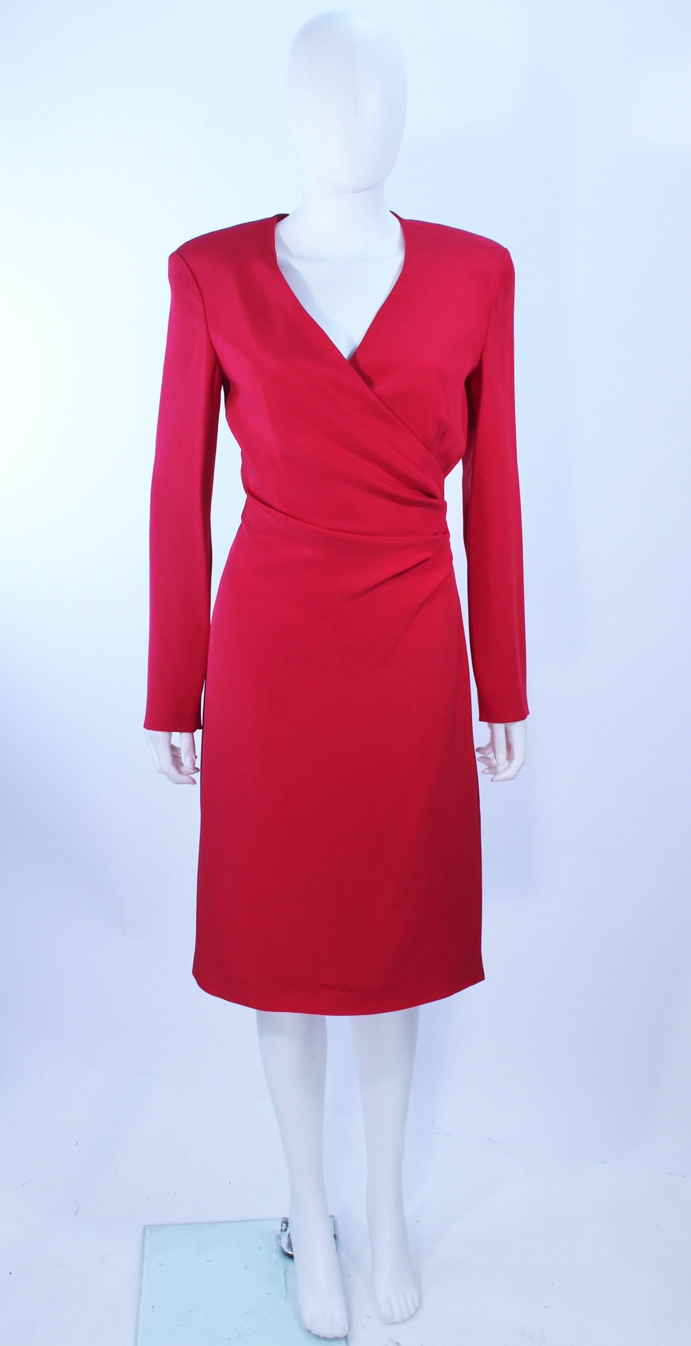 This Armani cocktail dress is composed of a magenta silk with a side draped design. Features a zipper closure. In excellent pre-owned condition, barely worn, if ever.

**Please cross-reference measurements for personal accuracy. Size in