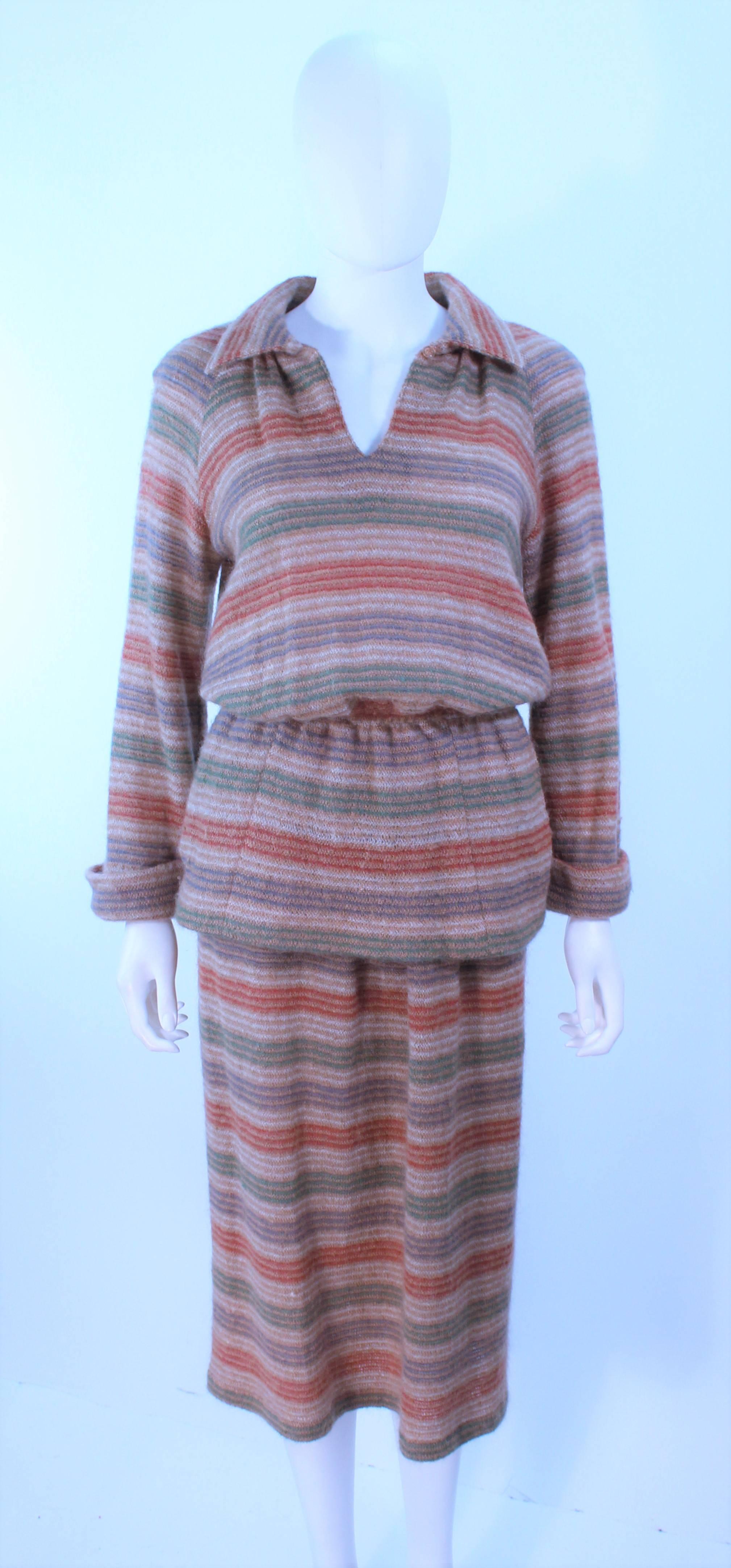 This Missoni design is composed of a khaki hue wool with a stripe design. The top is a tunic style with a center button at the neck. The skirt has side pockets with an elastic waist. In excellent vintage condition.

**Please cross-reference