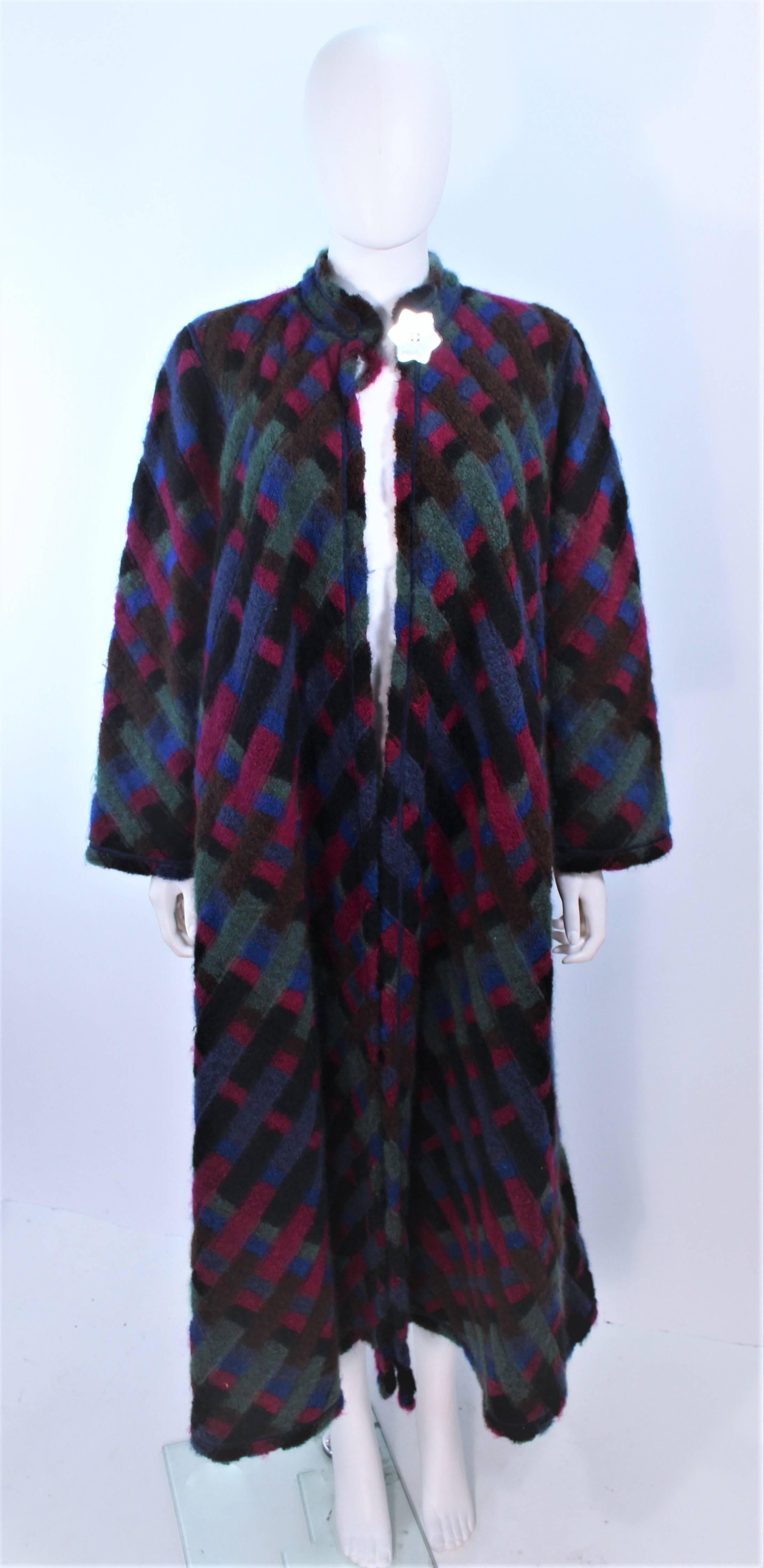 This Missoni design is composed of multi-color knit with a reversible green interior. Features side pockets with a center front mirror star button. In excellent vintage condition.

**Please cross-reference measurements for personal accuracy. Size