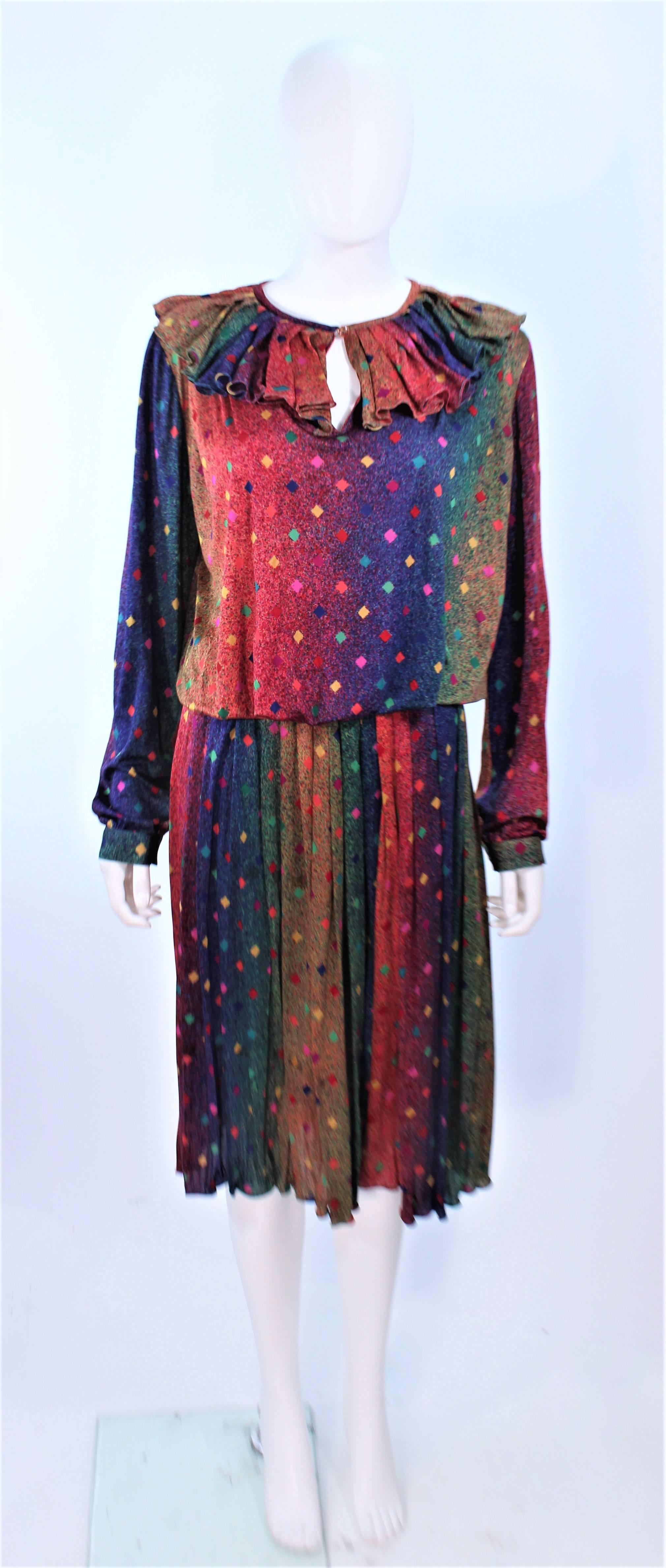 This Missoni design is composed of a rainbow patterned silk with a ruffle collar. The skirt has a pleated style with an elastic waist. In excellent vintage condition.

**Please cross-reference measurements for personal accuracy. Size in