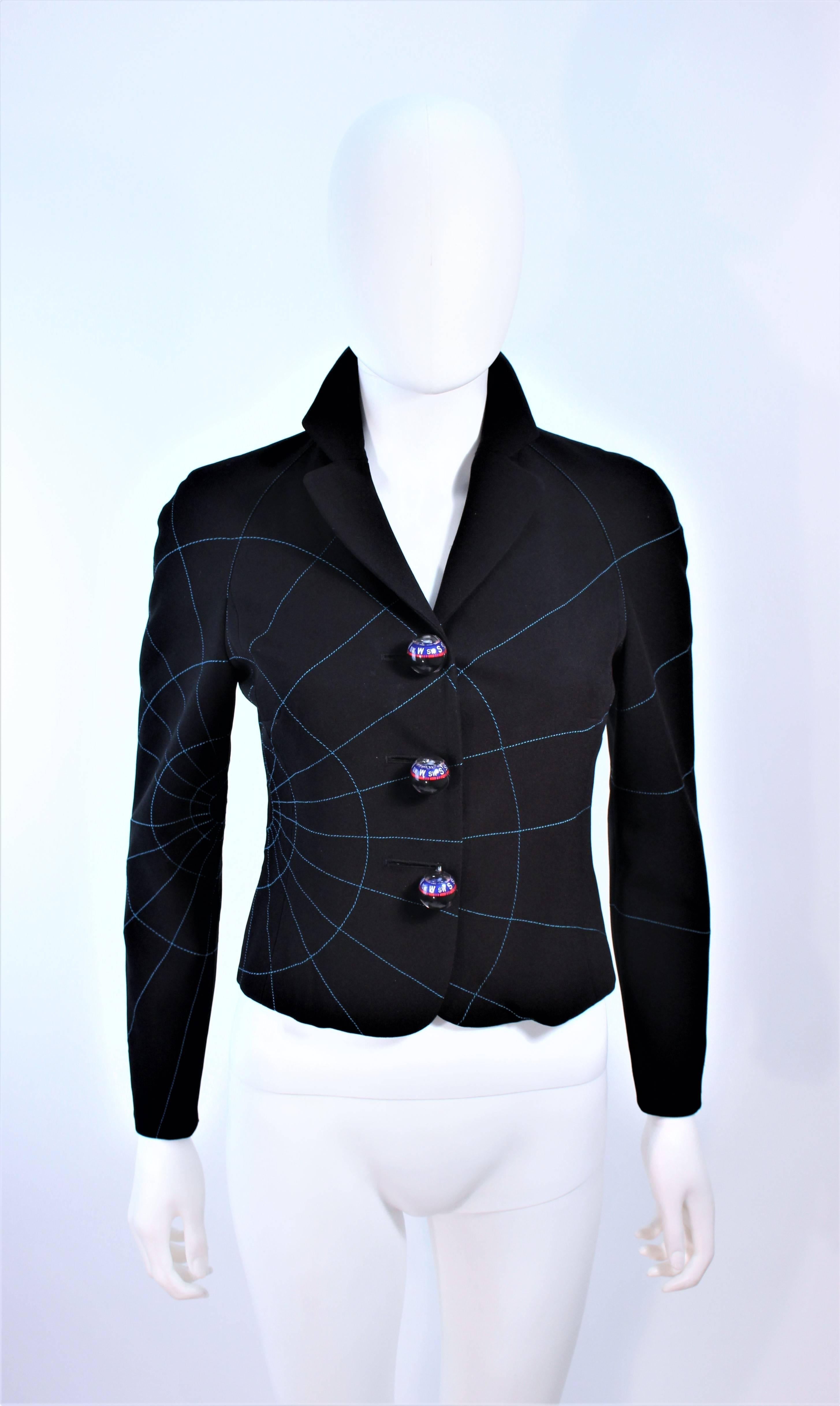 This Moschino Cheap & Chic jacket is composed with a black wool and features a geographic coordinates pattern with functional compass buttons. In excellent pre-owned condition.

**Please cross-reference measurements for personal accuracy. Size in