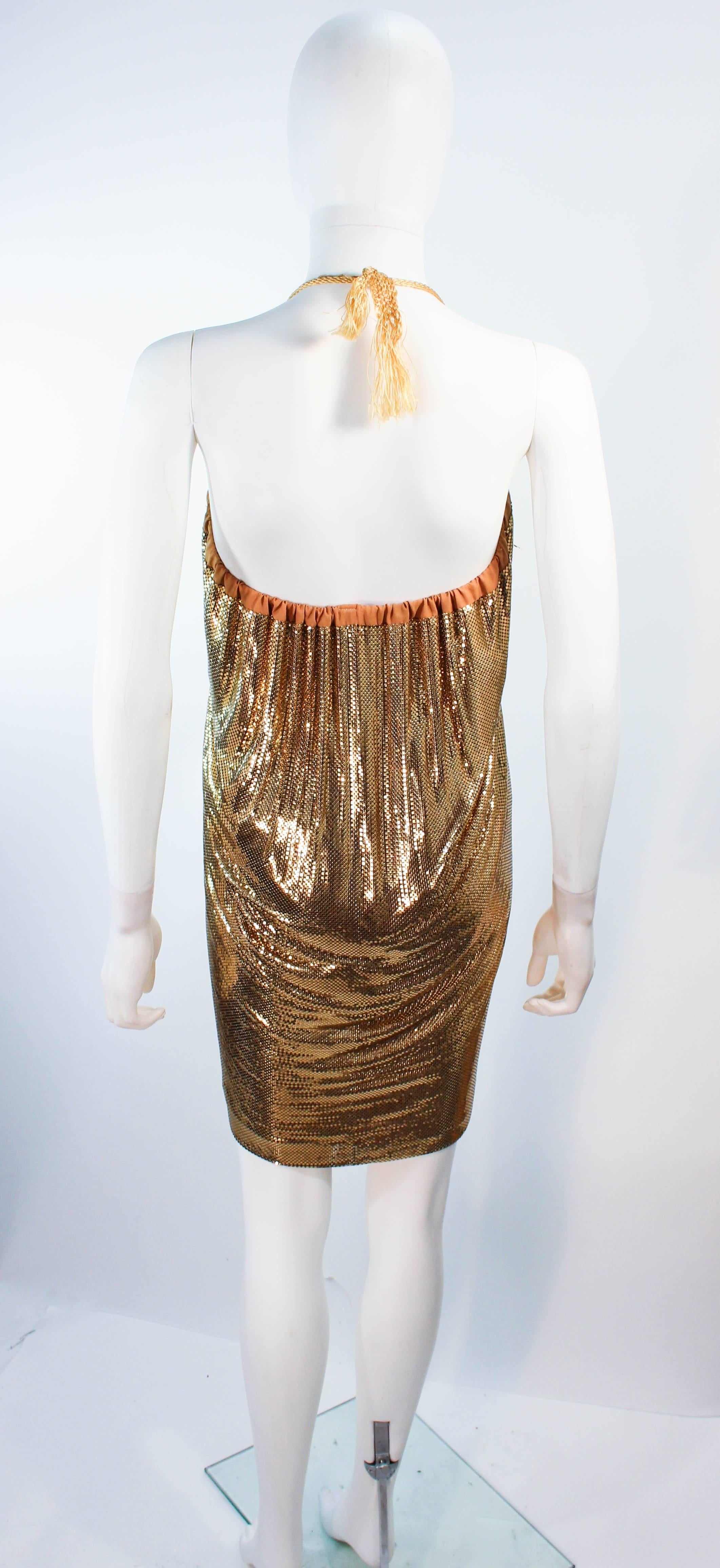 WHITING AND DAVIS robe ou jupe en maille dorée avec pompon  en vente 3