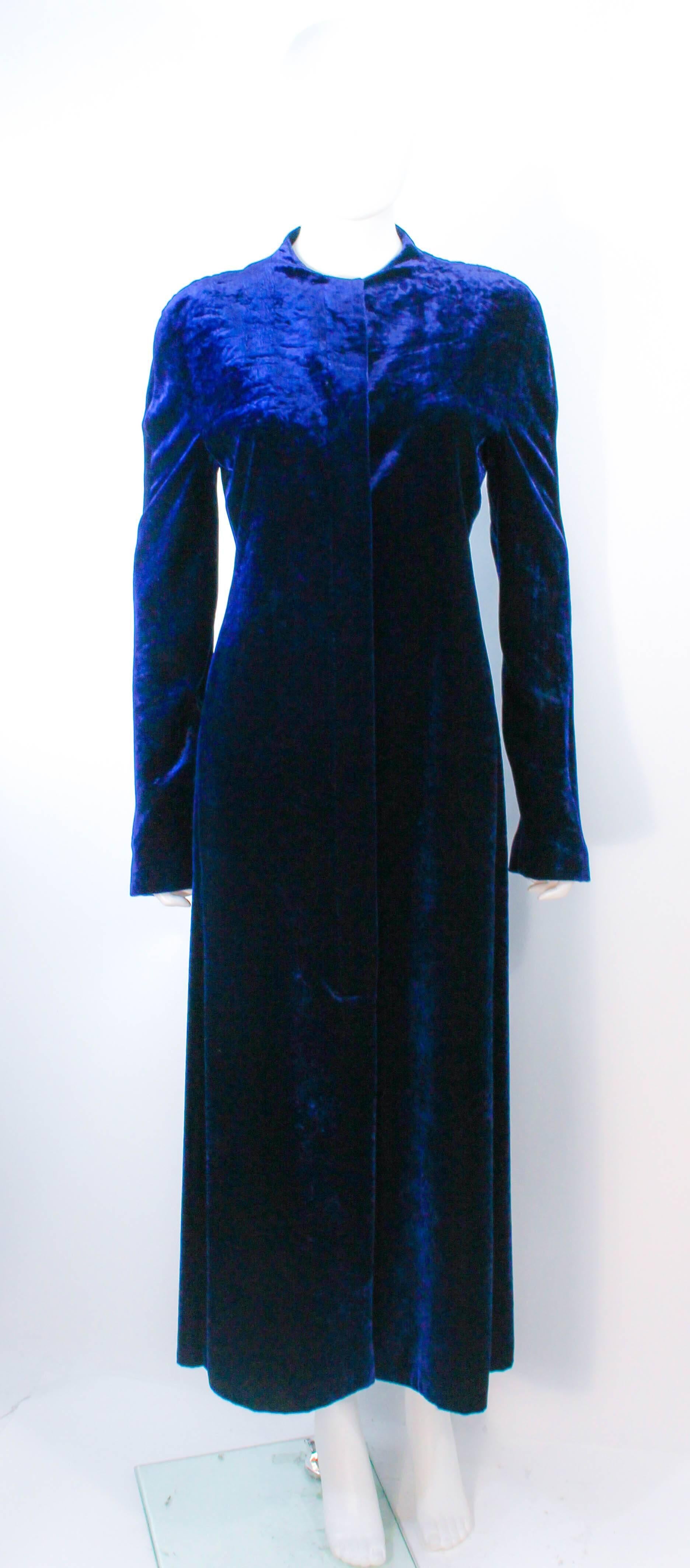This Krizia design is composed of a rich royal midnight blue velvet (silk/viscose blend). Features center front buttons with side pockets. In excellent vintage condition.

**Please cross-reference measurements for personal accuracy. Size in