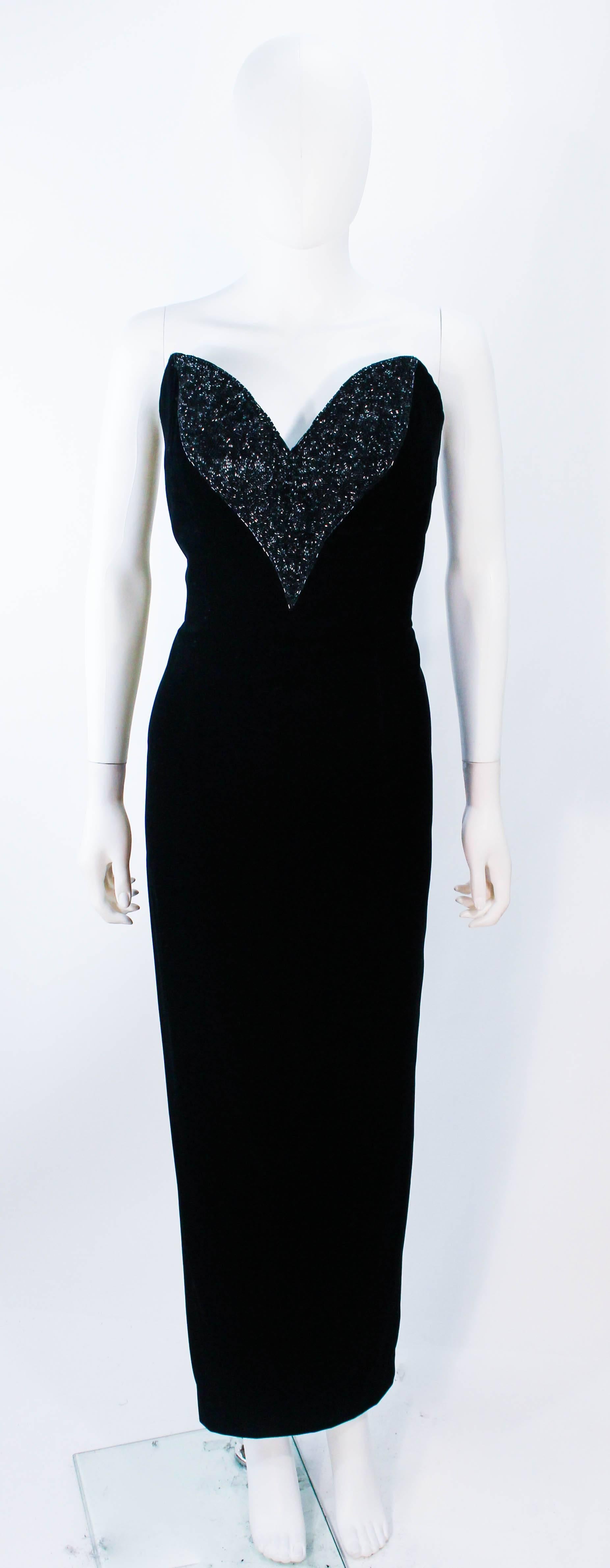 This Oleg Cassini Black Tie gown is composed of a black velvet. Features an absolutely stunning beaded bust with sweet heart neckline. Such an easy an simplistically chic design. There is a zipper closure. Made in USA. 

**Please cross-reference