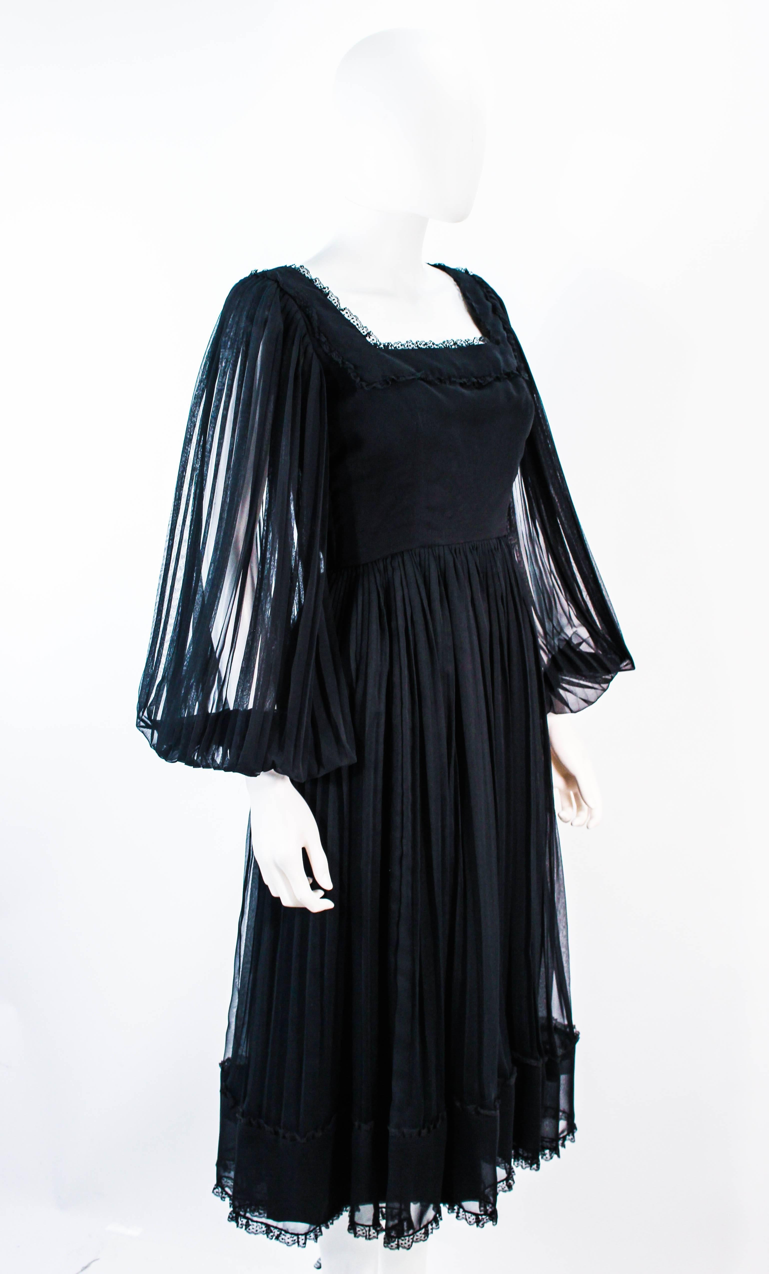 JEAN LOUIS Black Pleated Lace Dress with Sheer Sleeves Size 4 6 In Excellent Condition For Sale In Los Angeles, CA