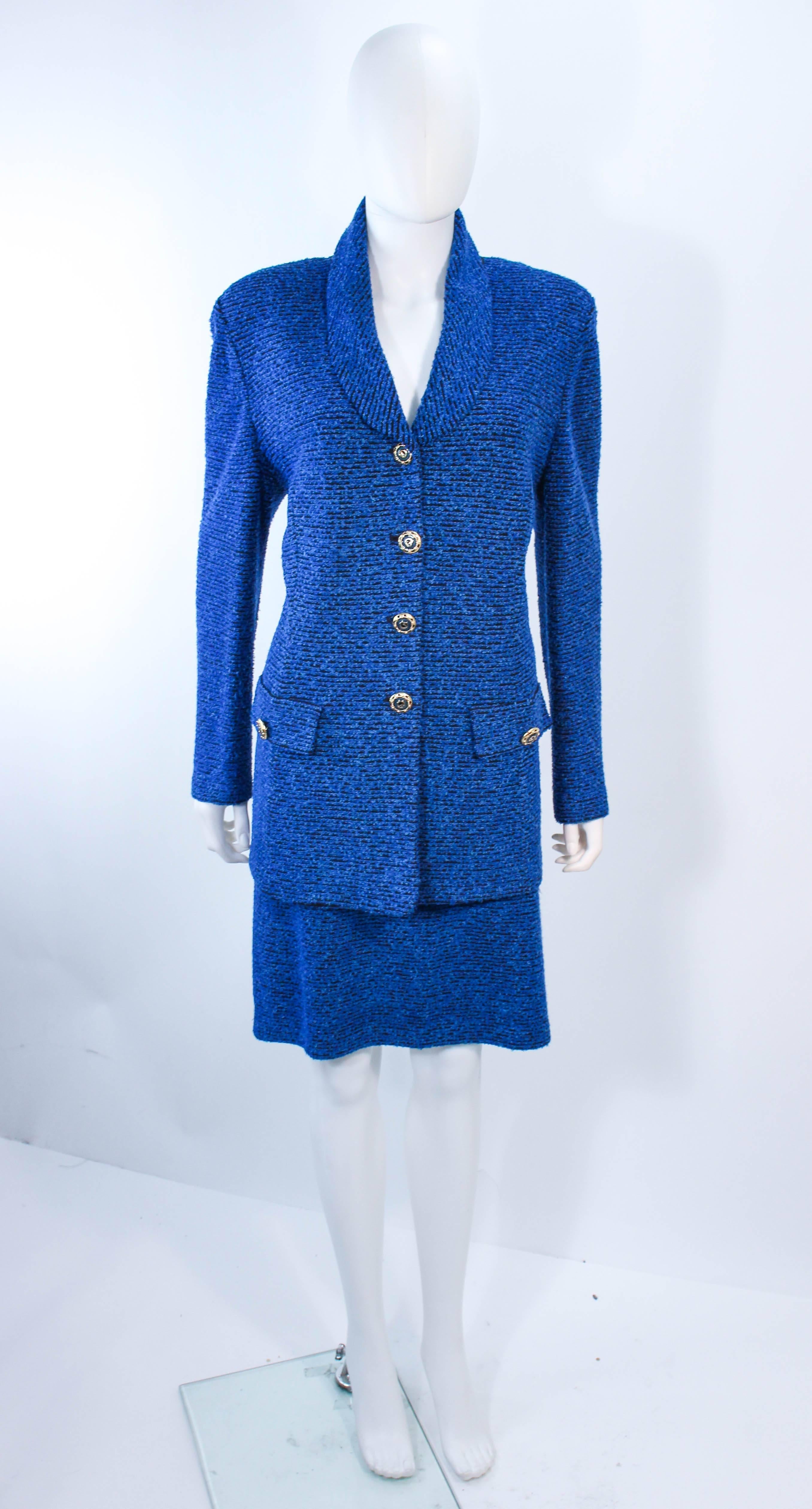 This vintage St. John suit is composed of a royal blue stretch knit wool. The jacket has a classic style with center front buttons and pockets. The skirt has a pencil style with elastic waist. In excellent vintage condition.

**Please