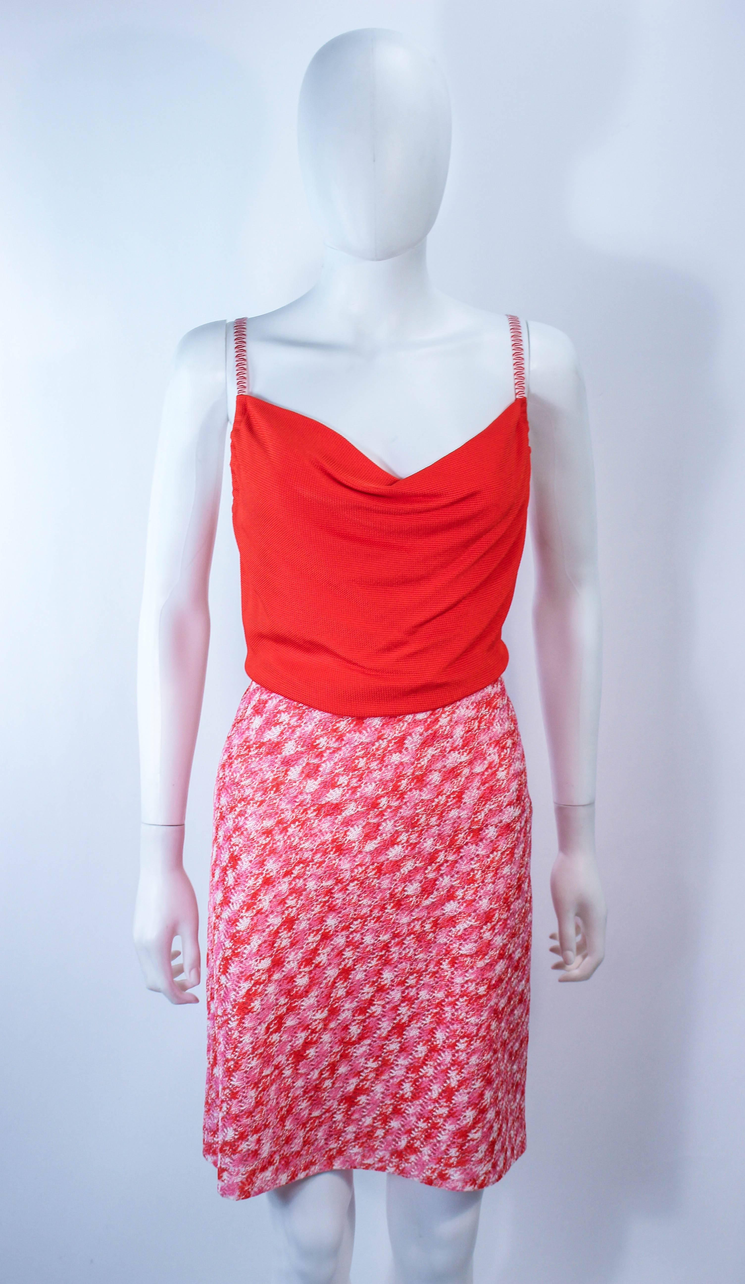This Missoni set is composed of an orange, pink, and white knit with a space die pattern. The dress has a draped neck and  side zipper closure with snaps. In excellent condition.

**Please cross-reference measurements for personal accuracy. Size in