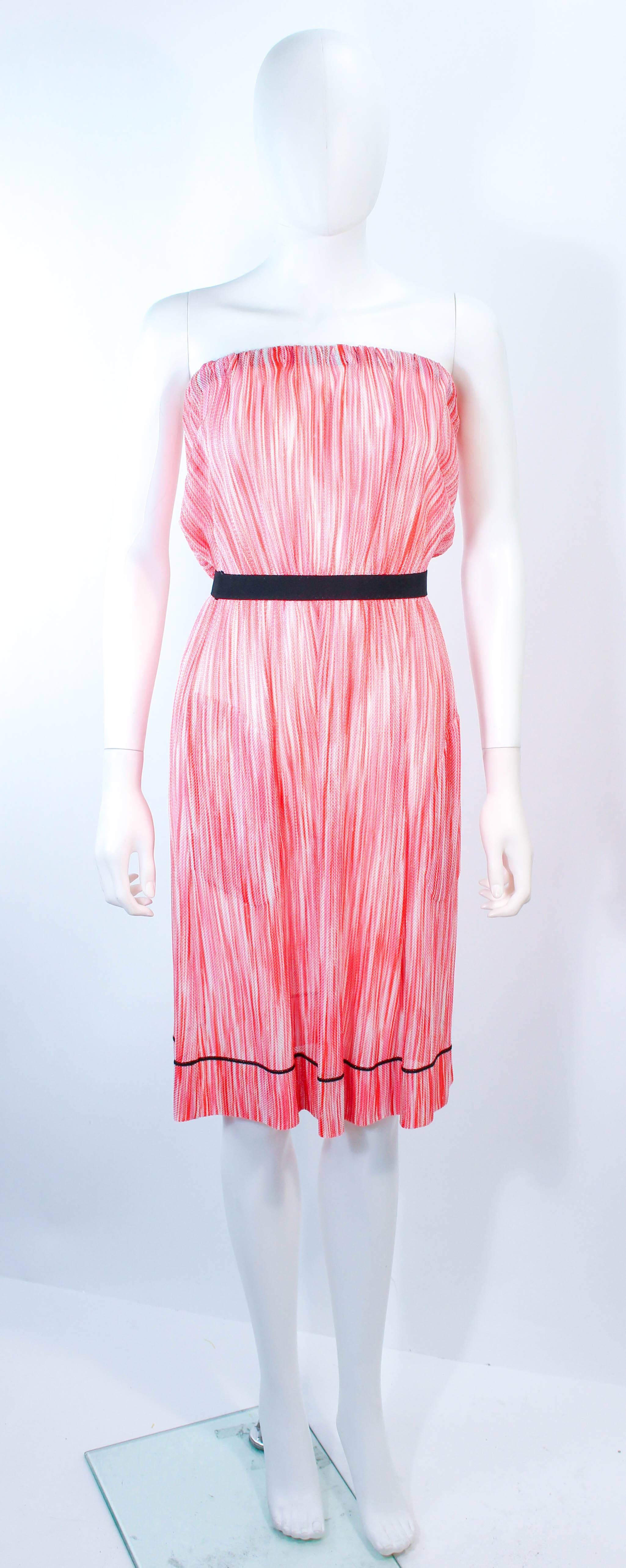 This Missoni dress is composed of a orange, white, and pink knit. Features a pull over style. In excellent condition.

**Please cross-reference measurements for personal accuracy. Size in description box is an estimation. 

Measures