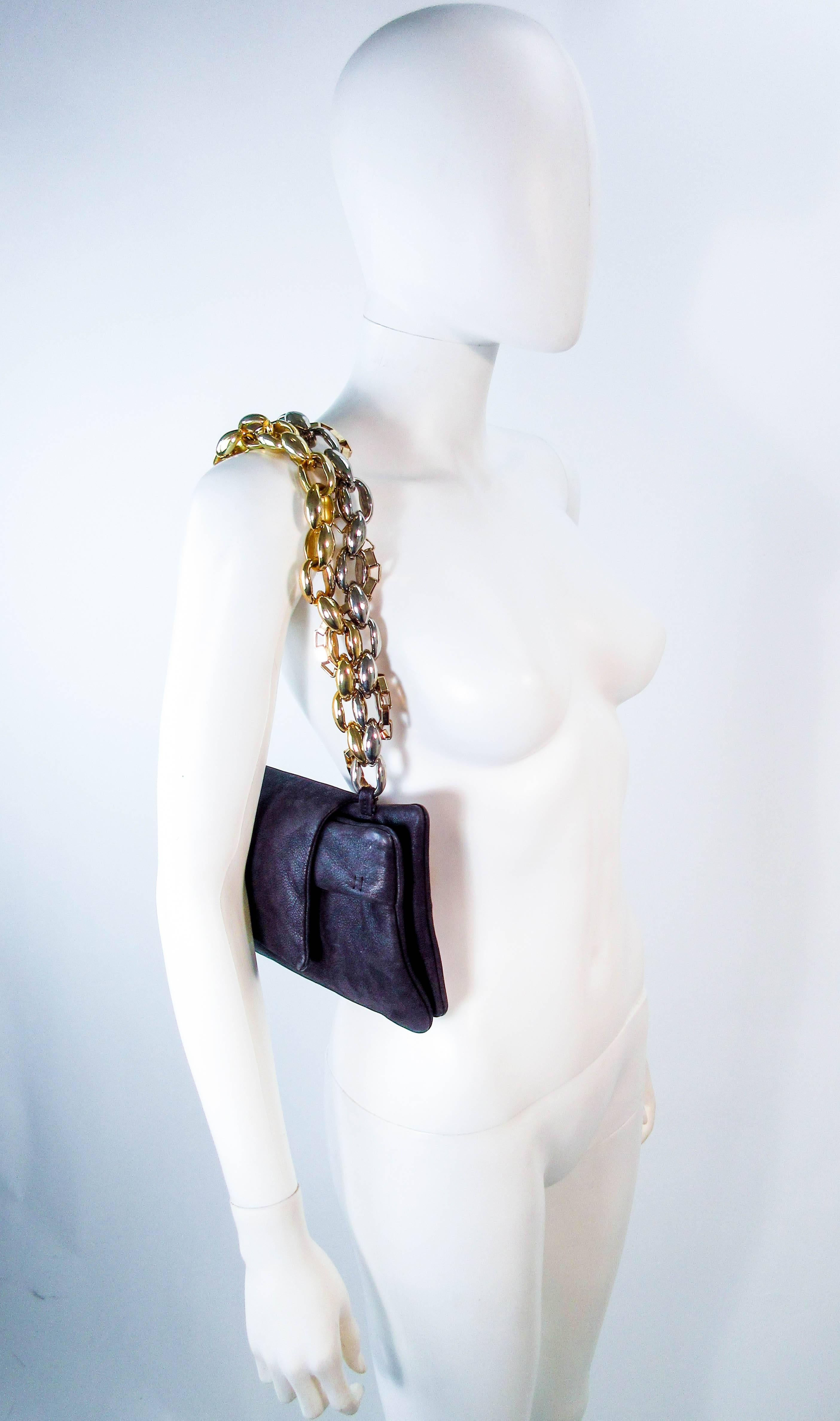 PAULE KA Black Leather Chain Pocket Book Clutch In Excellent Condition In Los Angeles, CA