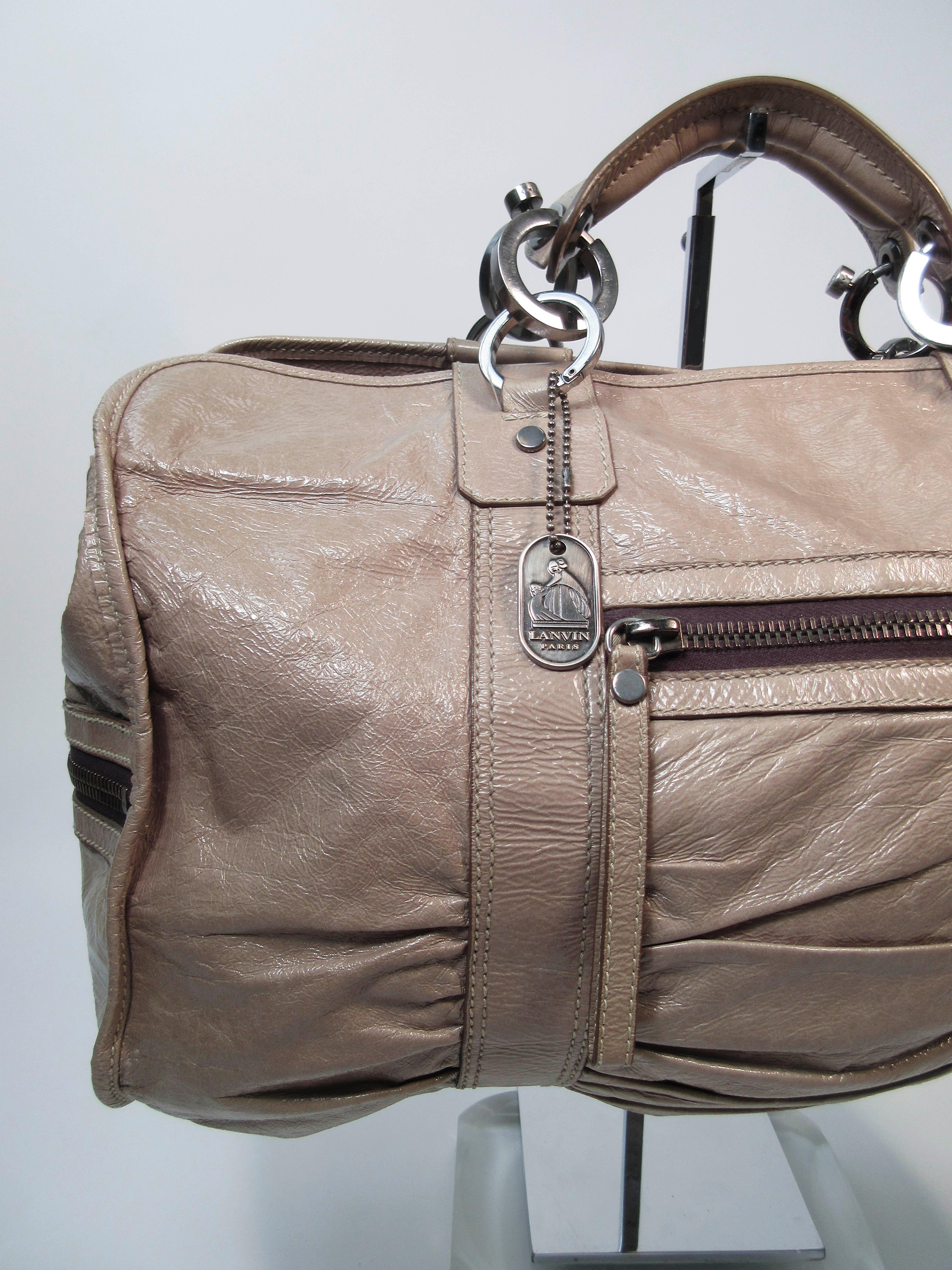 taupe patent leather handbag