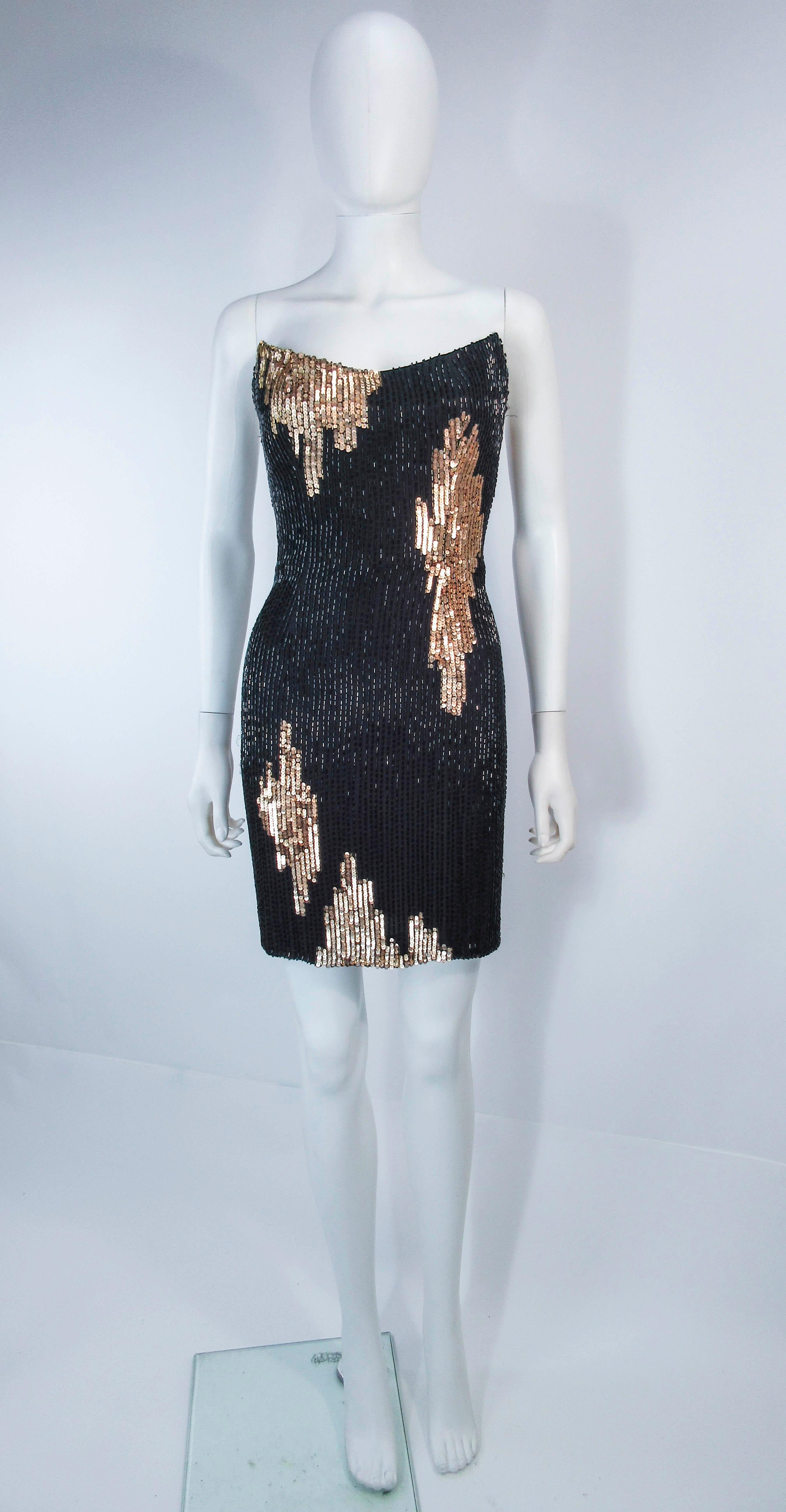 This Bob Mackie cocktail dress is composed of a black silk with black & gold beading.  Features a gorgeous darted bust line and mini length. There is a center back zipper closure. In excellent vintage condition.

**Please cross-reference
