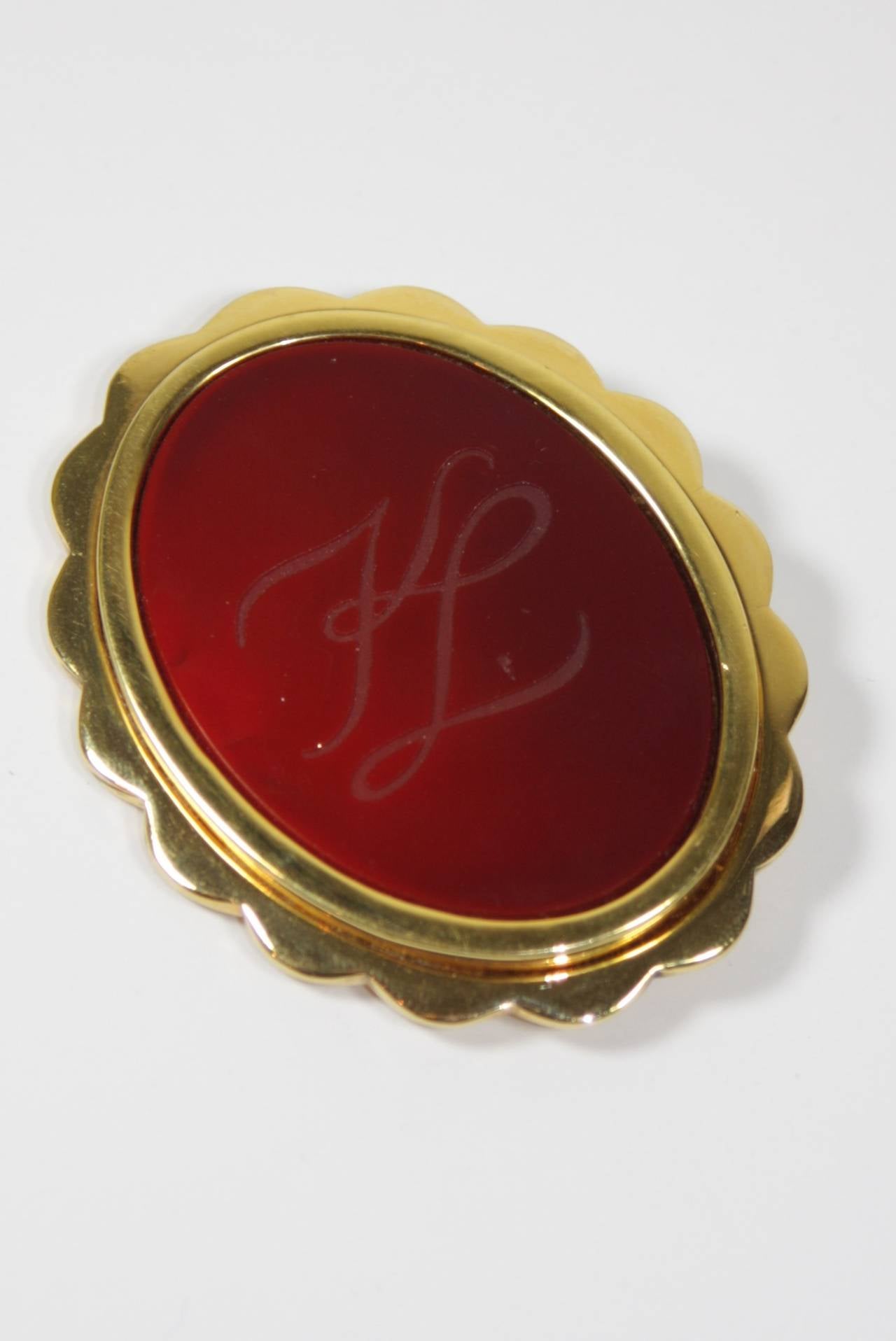 Karl Lagerfield Red Glass with KL Engraved Monogram in a Gold Tone Frame Brooch In Excellent Condition In Los Angeles, CA