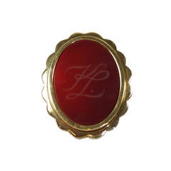 Karl Lagerfield Red Glass with KL Engraved Monogram in a Gold Tone Frame Brooch